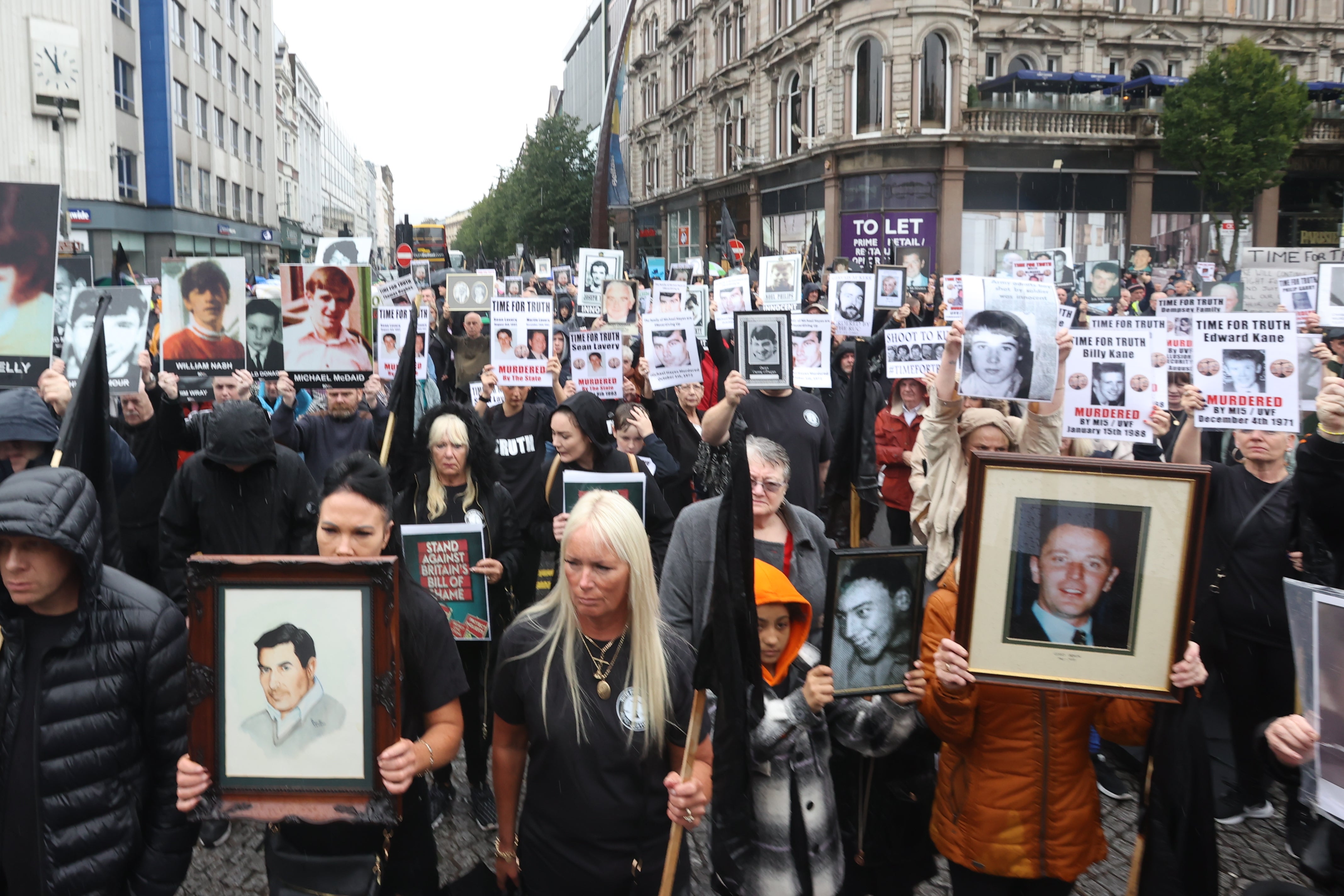 People march through Belfast city centre during the Time for Truth rally (Liam McBurney/PA)