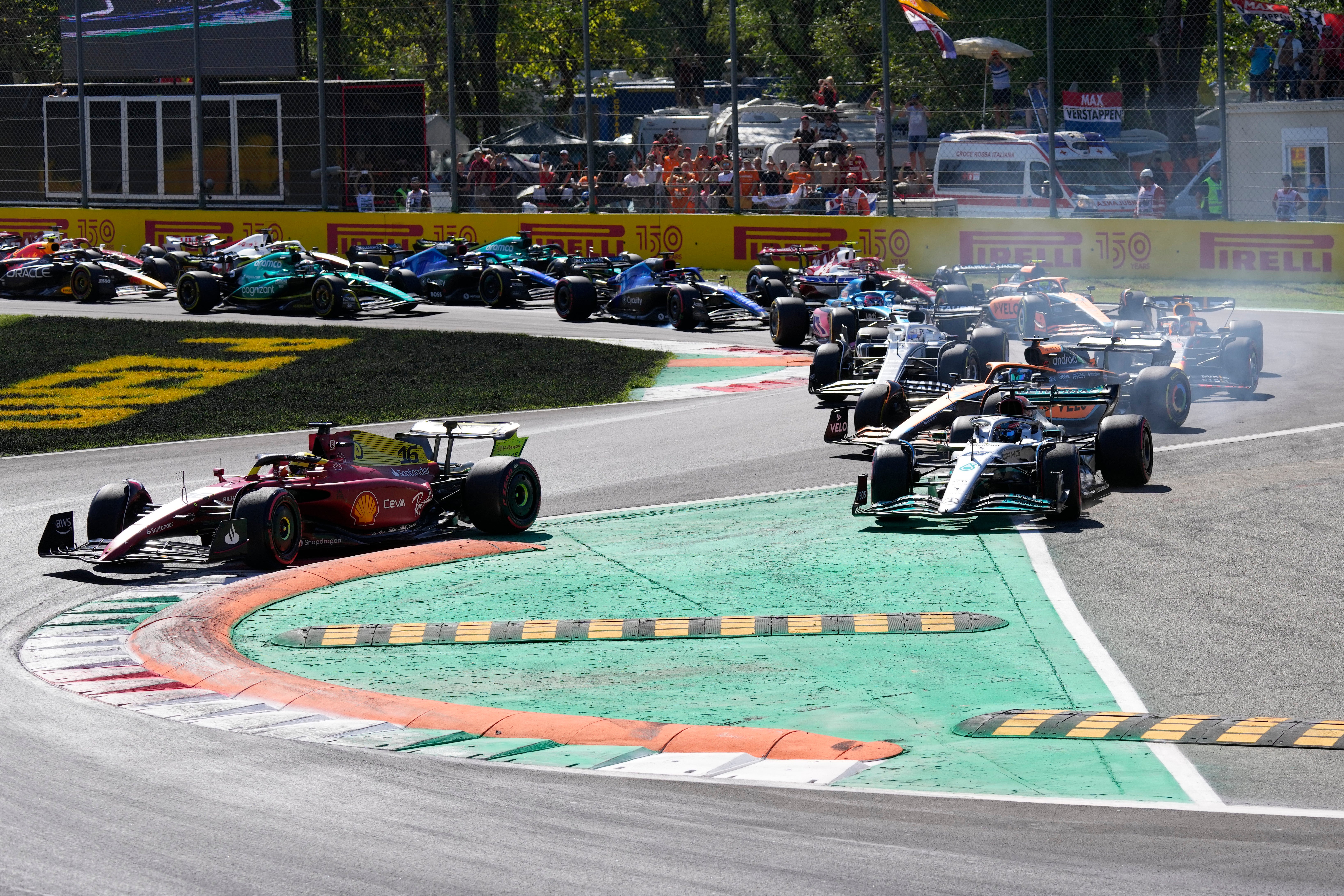 Ferrari driver Charles Leclerc of Monaco, left, steers his car during the Italian Grand Prix