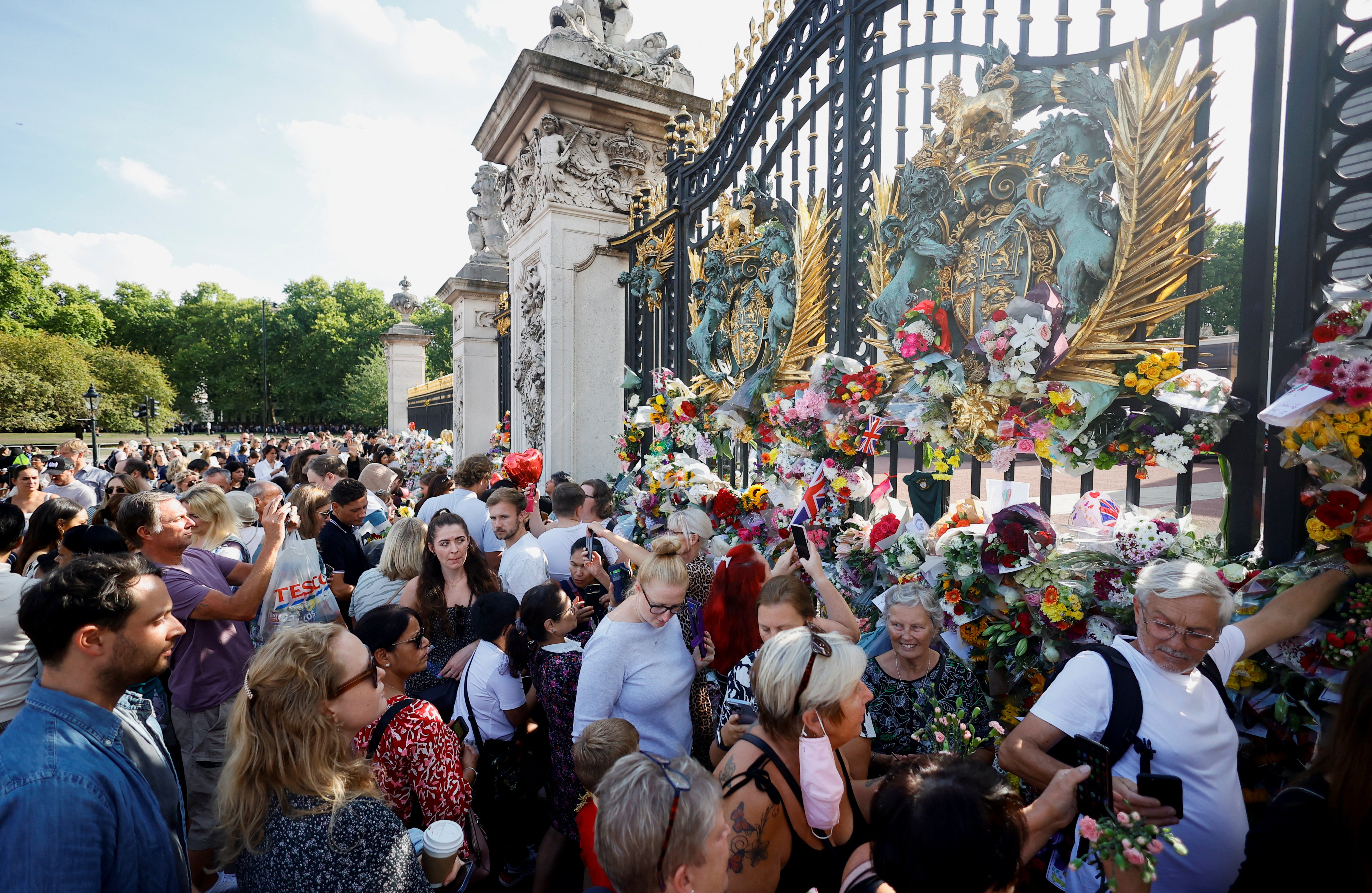 Laying tributes as a crowd felt like a ‘communal experience’, some said