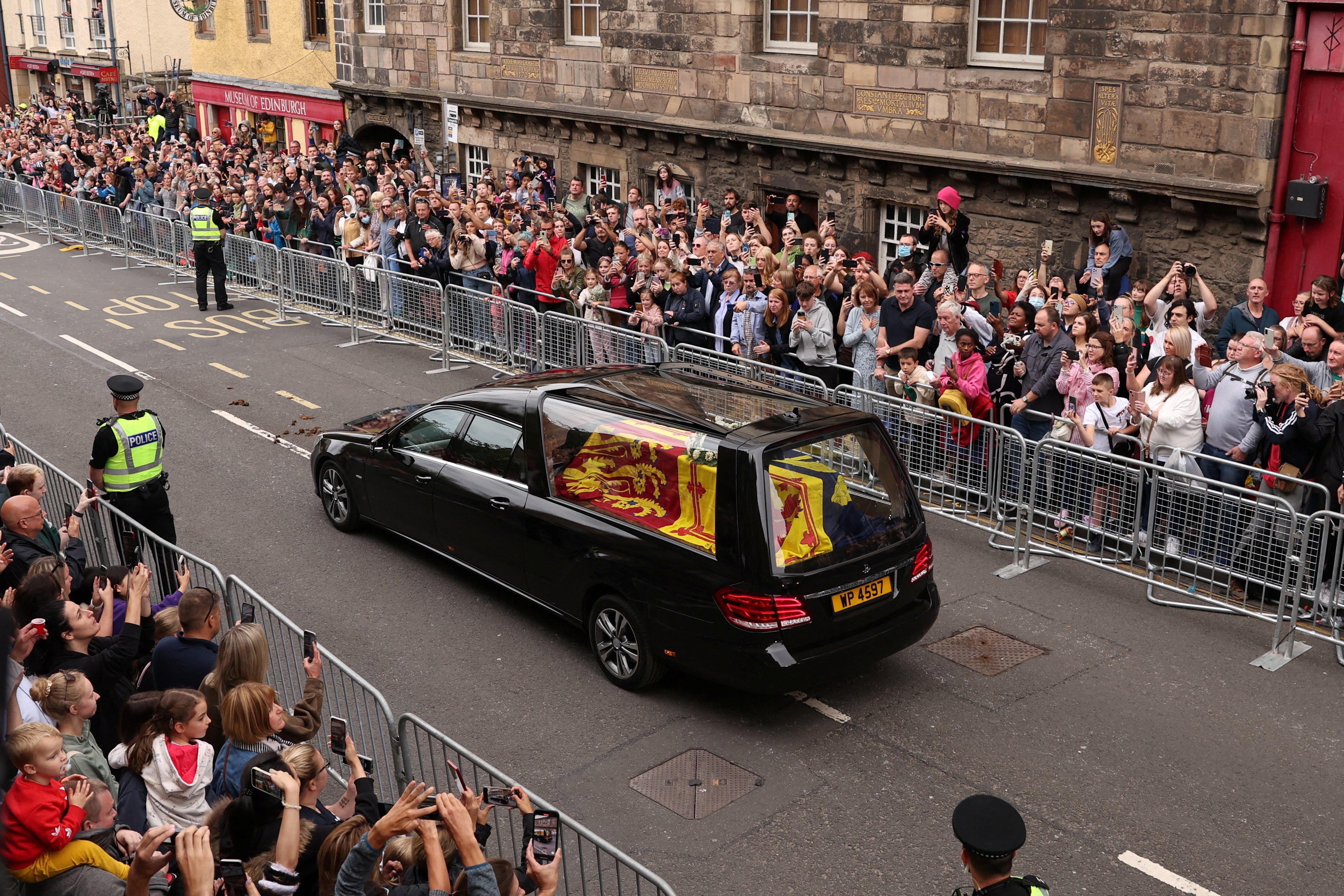 The hearse carrying the coffin of Queen Elizabeth at The Royal Mile in Edinburgh