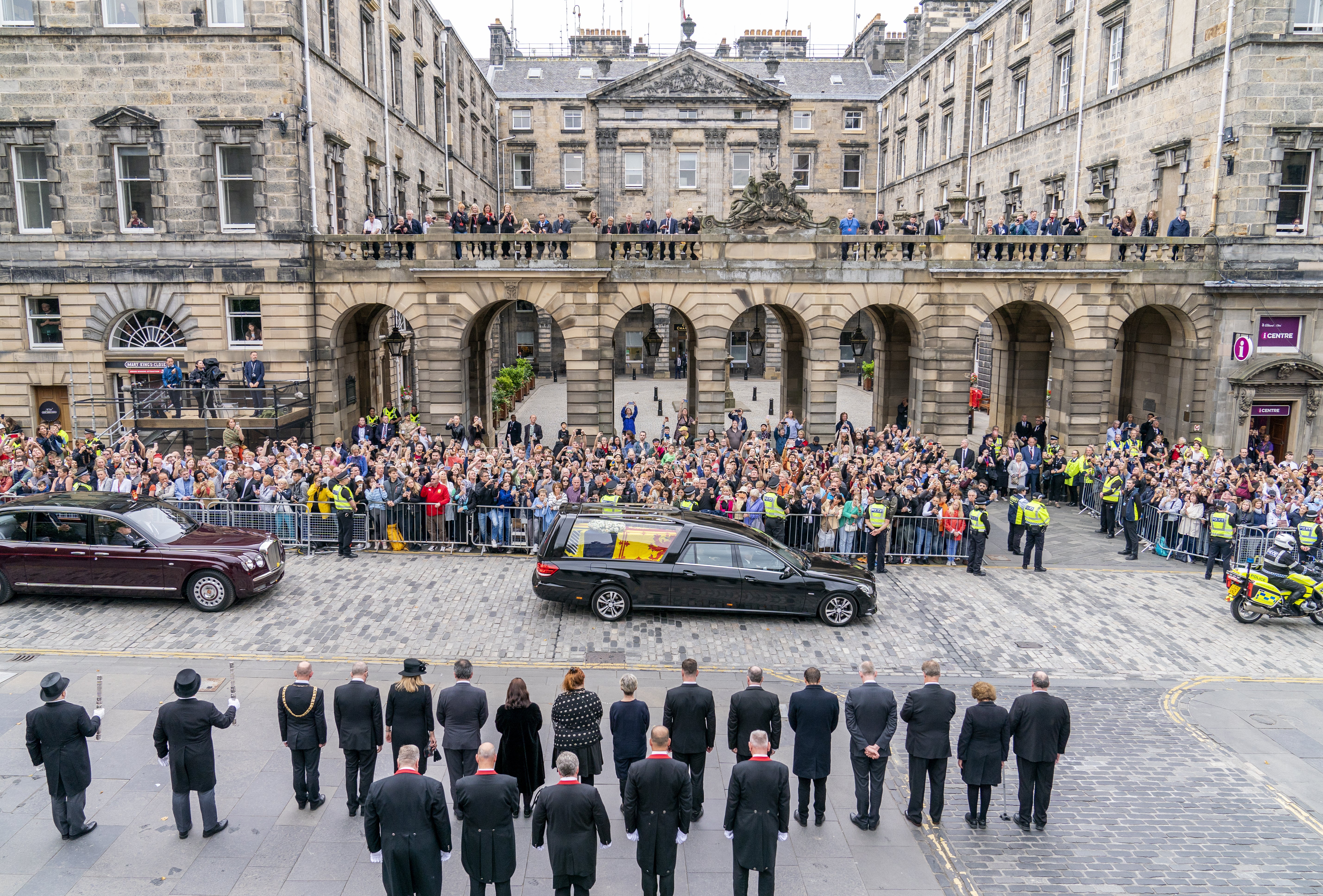 The hearse carrying the Queen’s coffin passes the City Chambers on the Royal Mile, Edinburgh