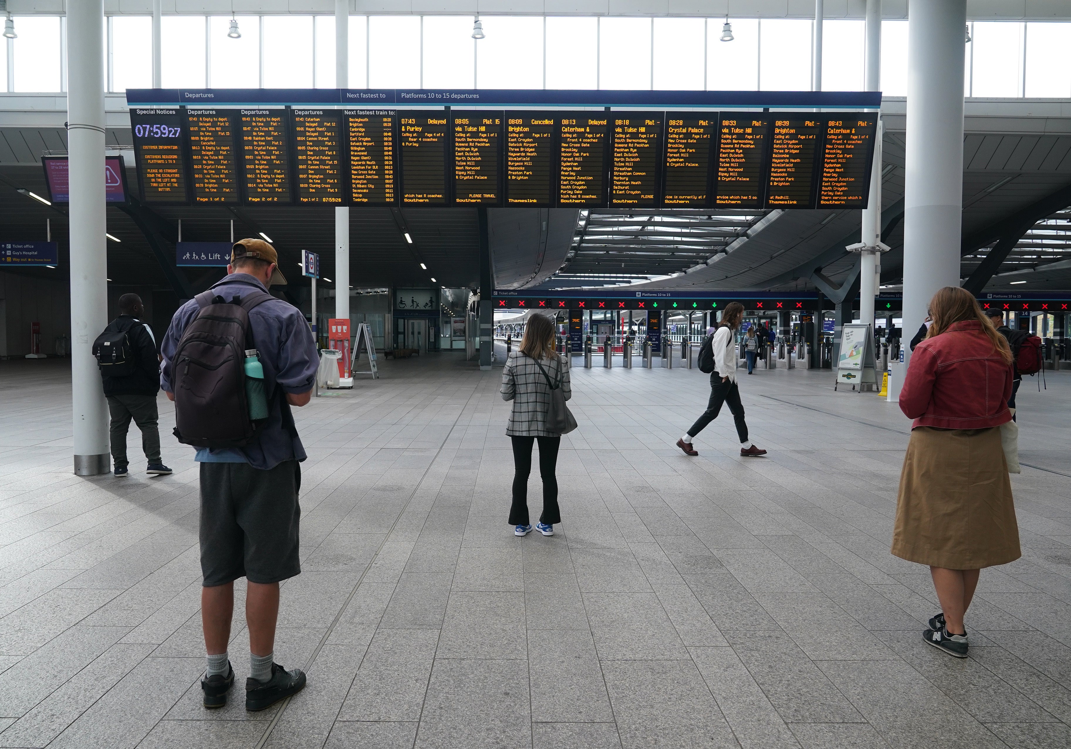 Commuters at London Bridge station (Yui Mok/PA)