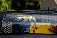 Funeral director branding on hearse carrying Queen’s body to Edinburgh disappears during journey