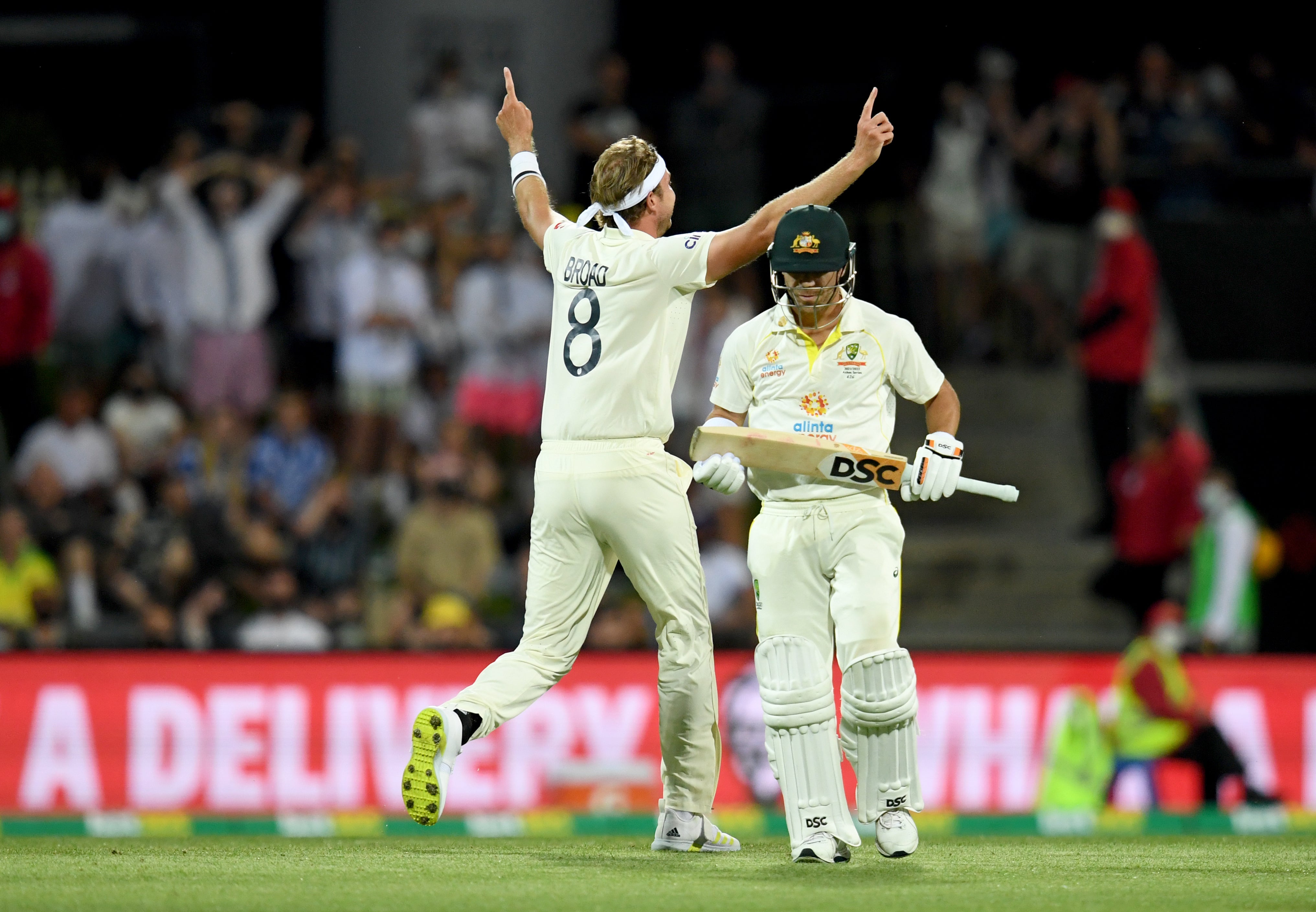 Stuart Broad has dominated Australia’s David Warner, right (Darren England via AAP/PA)