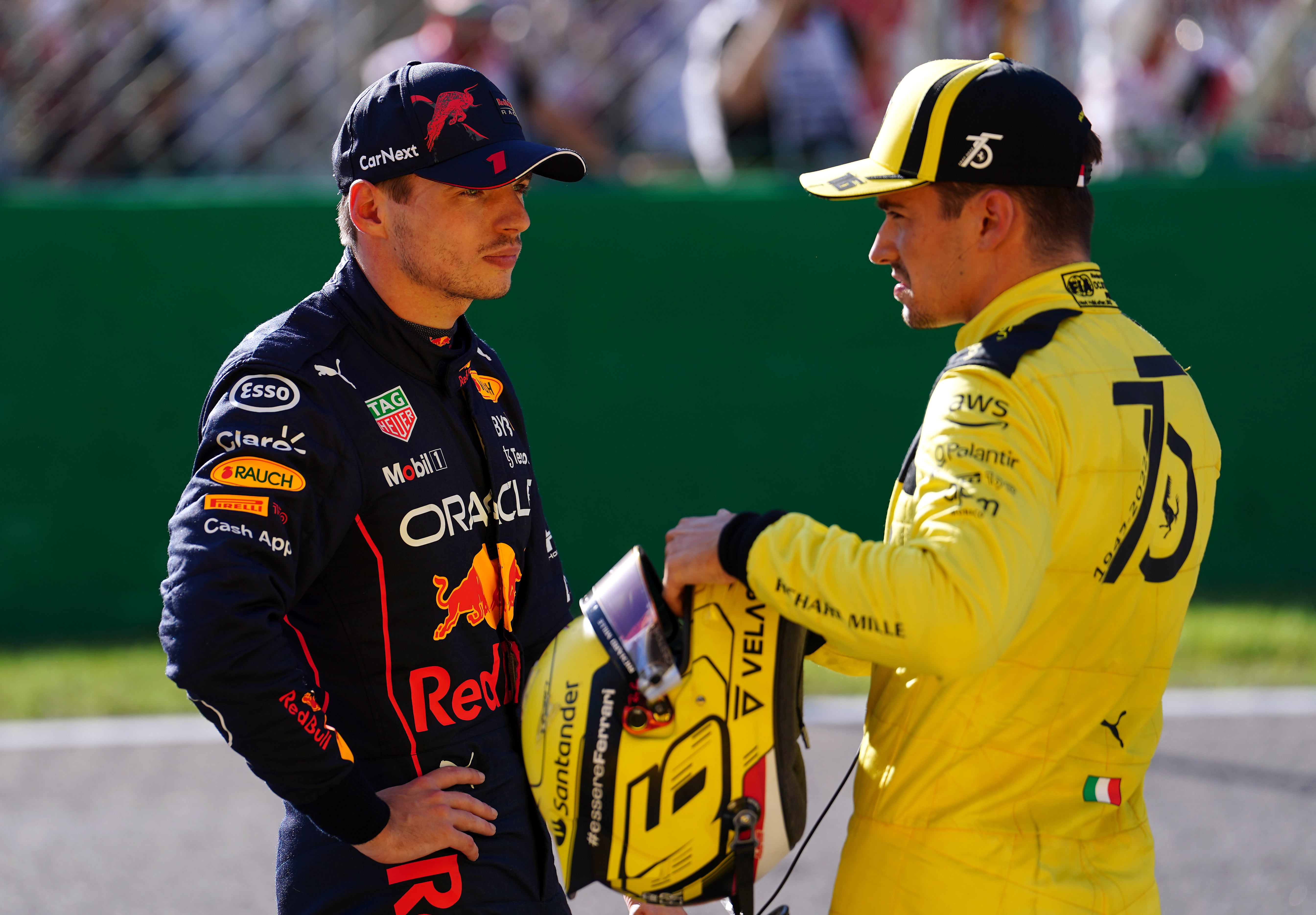 Max Verstappen holds a dominant lead over Charles Leclerc, right (David Davies/PA)