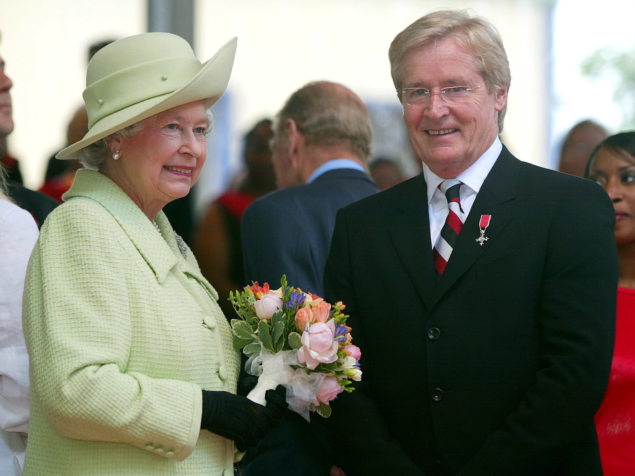 Queen Elizabeth II meets actor Bill Roache who plays Ken Barlow in Coronation Street, during her visit to Preston, Lancashire during her Jubilee celebration tour (Martin Rickett/PA)