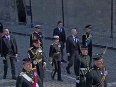 Queen’s four children join solemn march behind mother’s coffin in Edinburgh