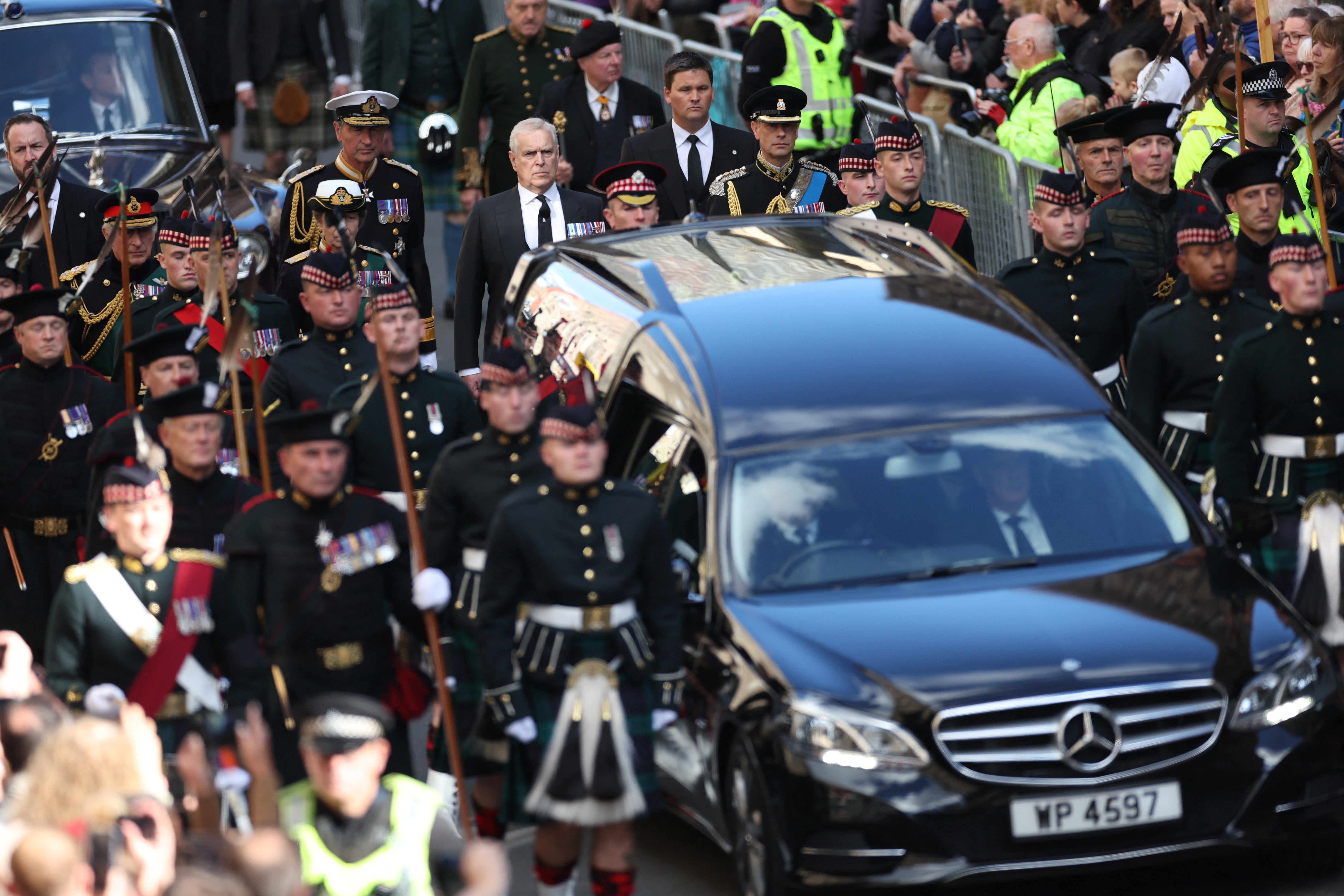 King Charles, Princess Anne, Prince Andrew and Prince Edward follow the hearse carrying the coffin of Britain's Queen Elizabeth, in Edinburgh, Scotland