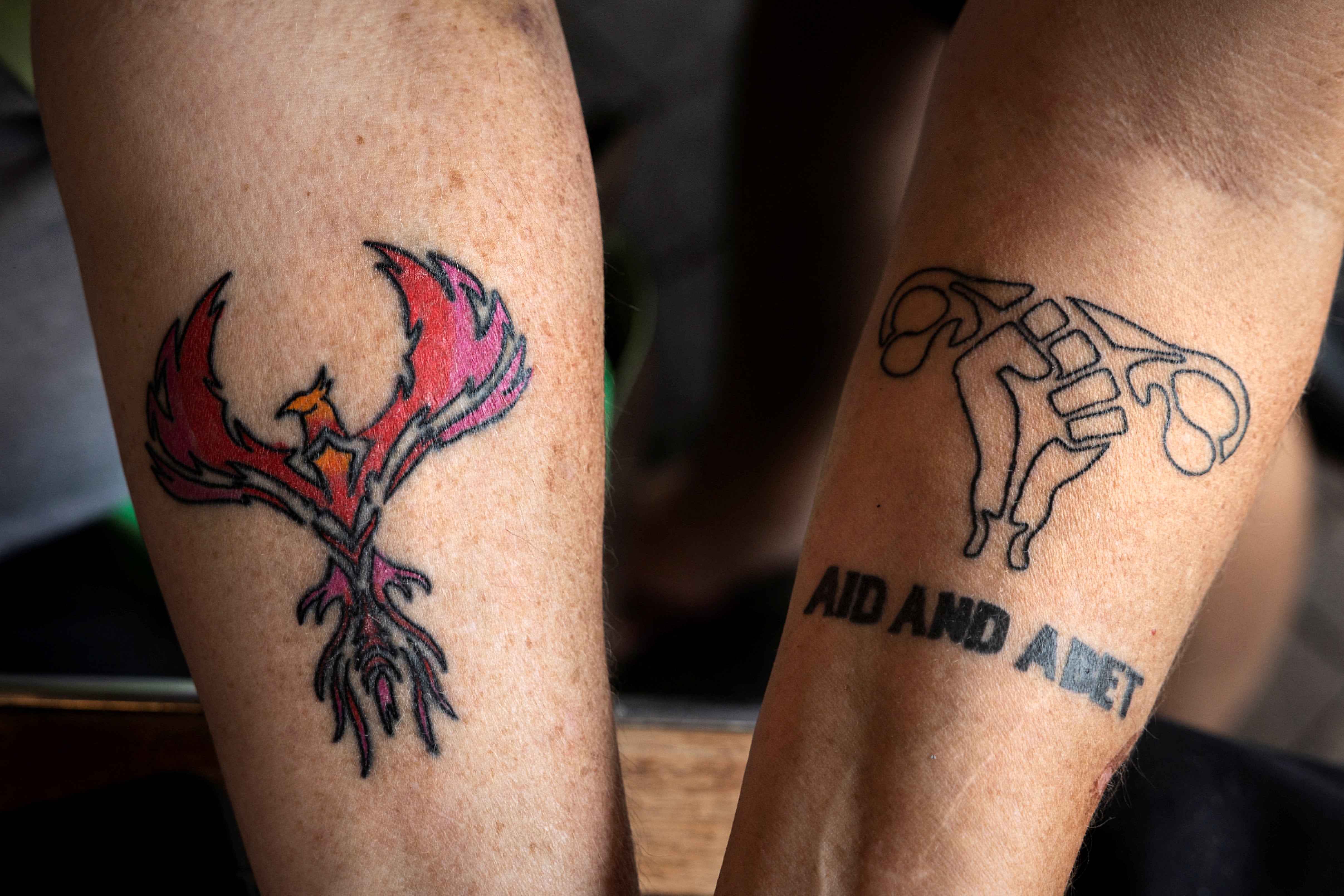 Stephanie Rosenwinge and Barbara Schwartz show off their new tattoos in Bristol, Tennessee, U.S., August 30, 2022