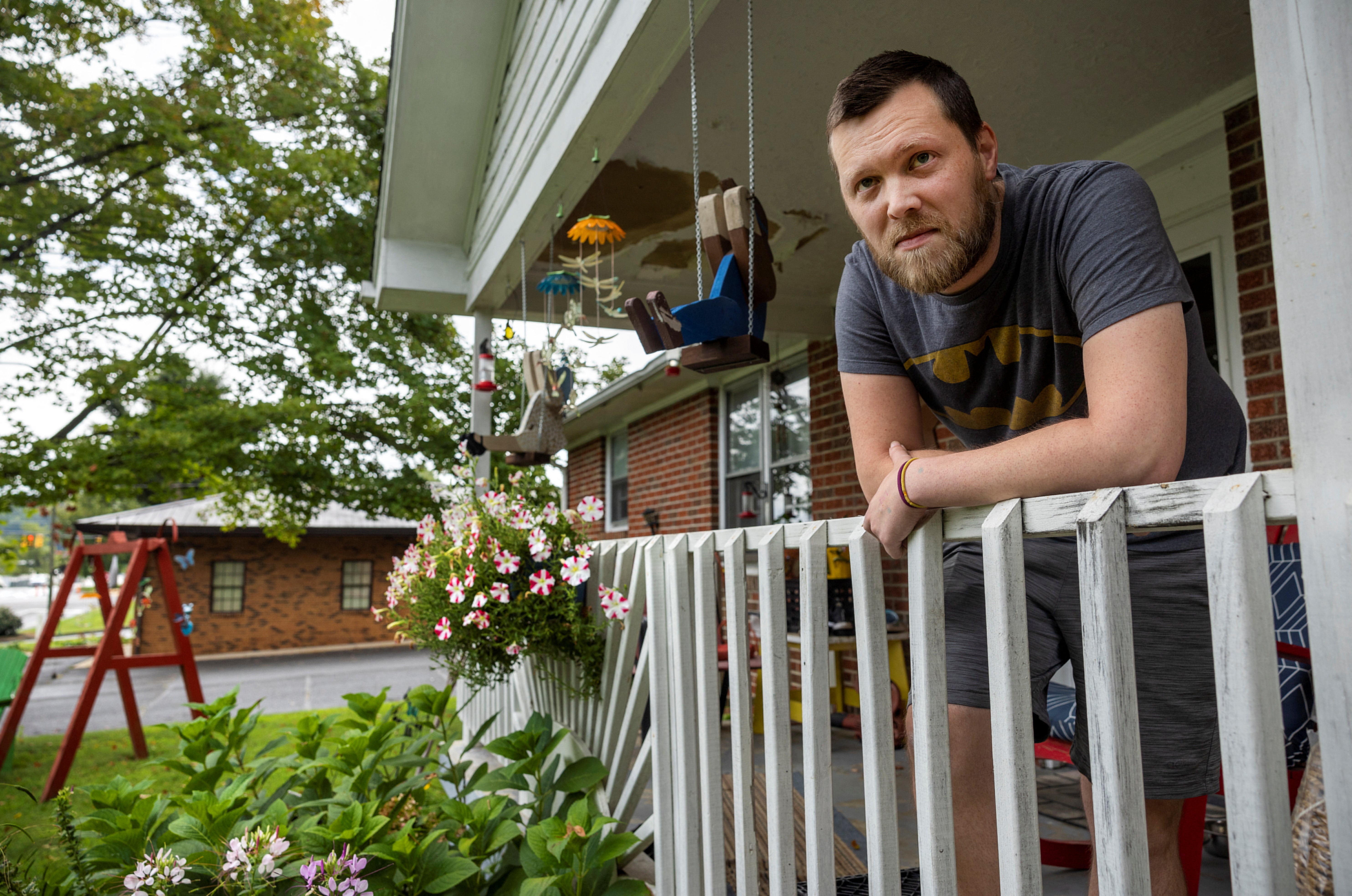 Chris Harber, whose yard is adjacent to the driveway of the new abortion clinic in Bristol, Virginia, U.S., stands on his front porch, August 30, 2022