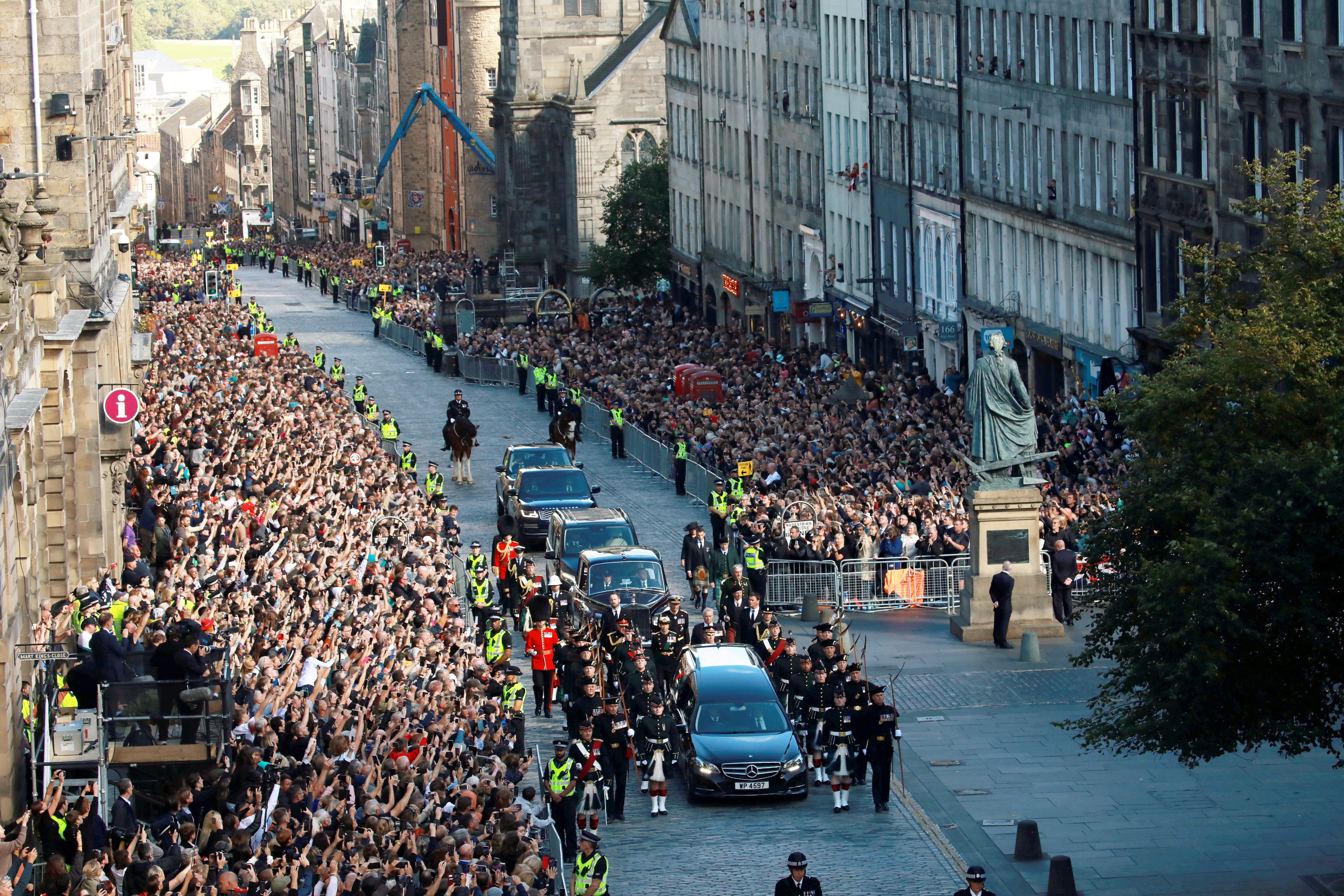 Crowds line the Royal Mile in Edinburgh as the Queen’s coffin is taken to the cathedral