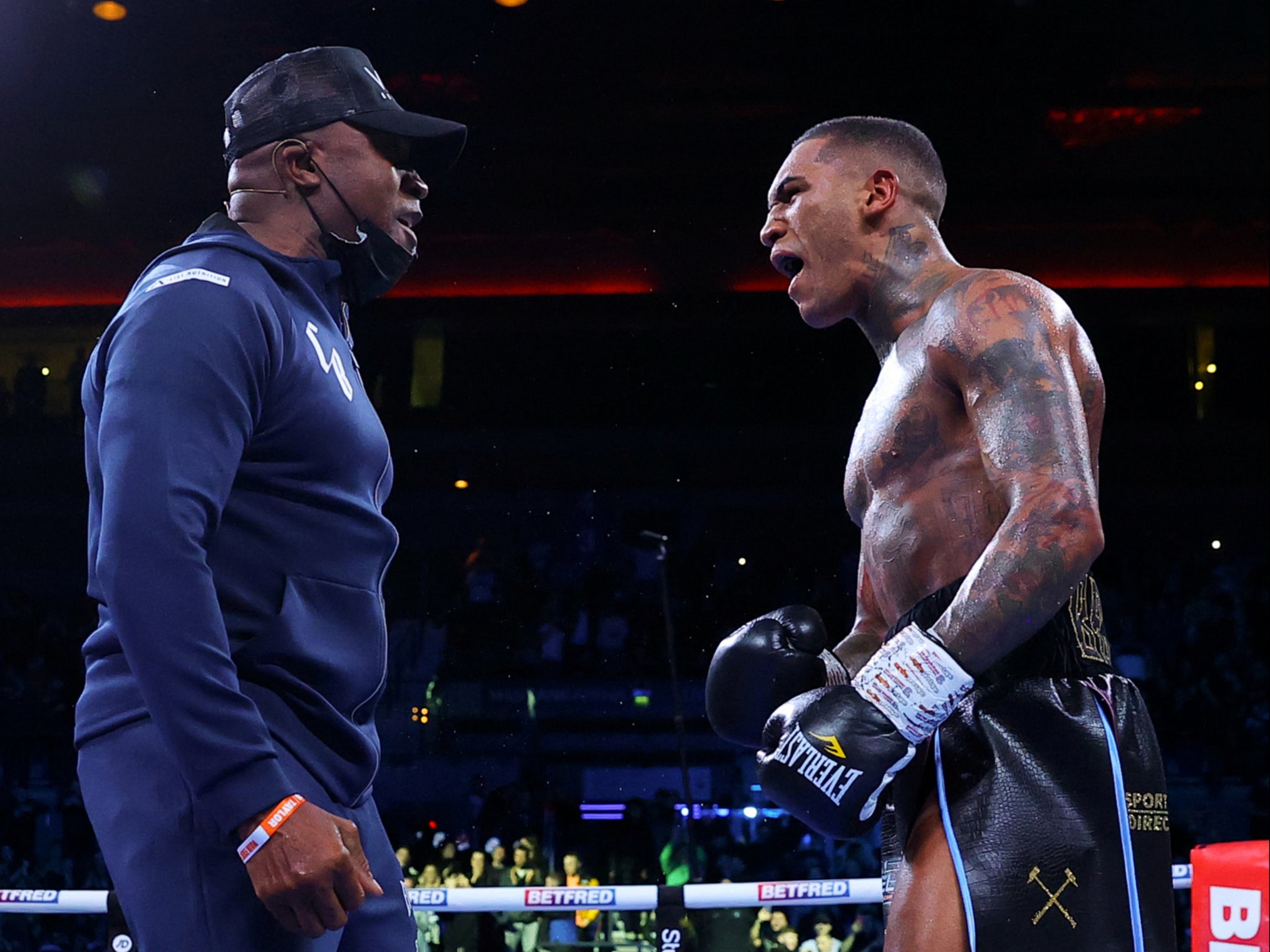 Conor Benn (right) celebrates with father Nigel in December 2021