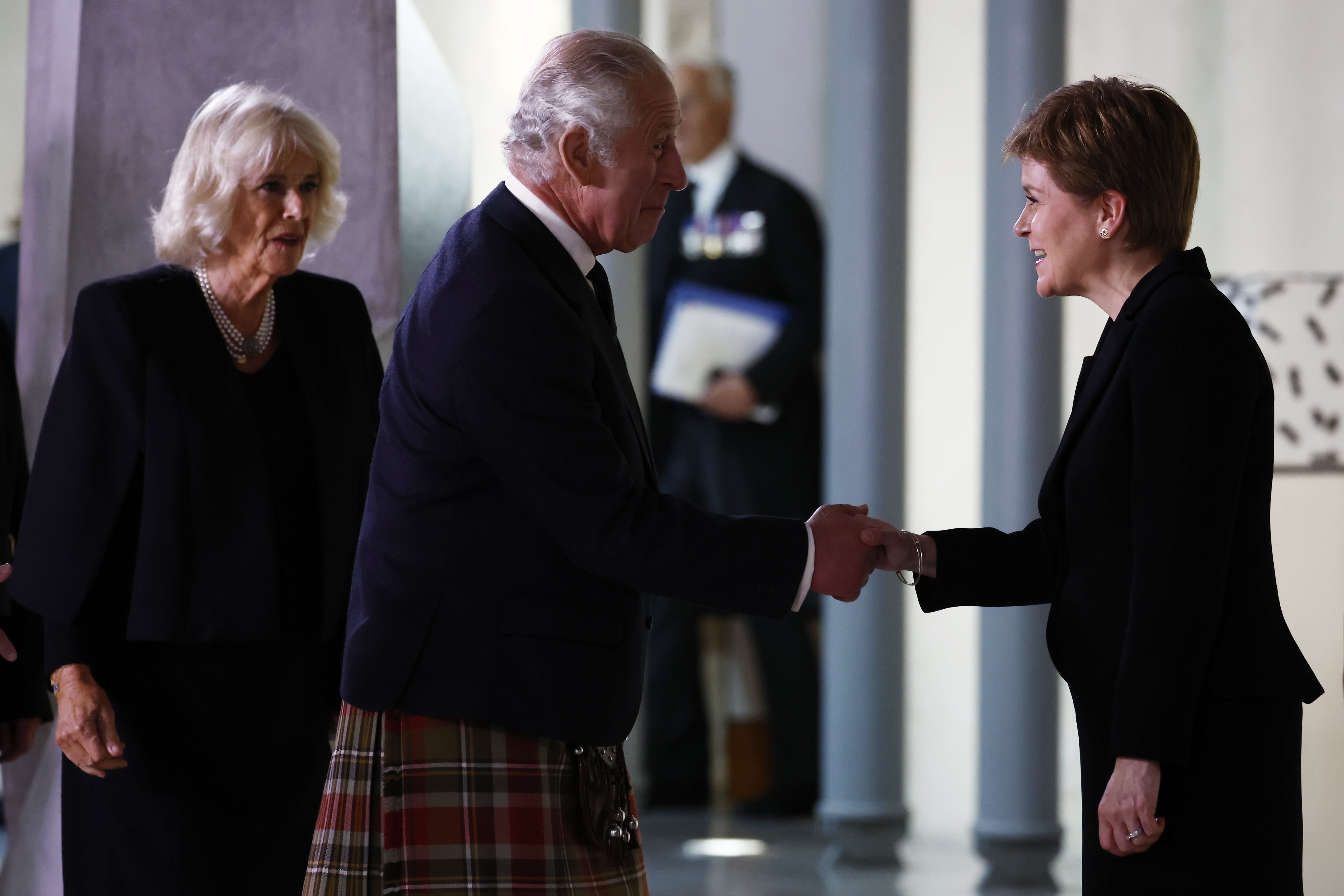 Charles and Camilla are greeted by First Minister of Scotland Nicola Sturgeon ahead of receiving a Motion of Condolence at the Scottish Parliament in Holyrood