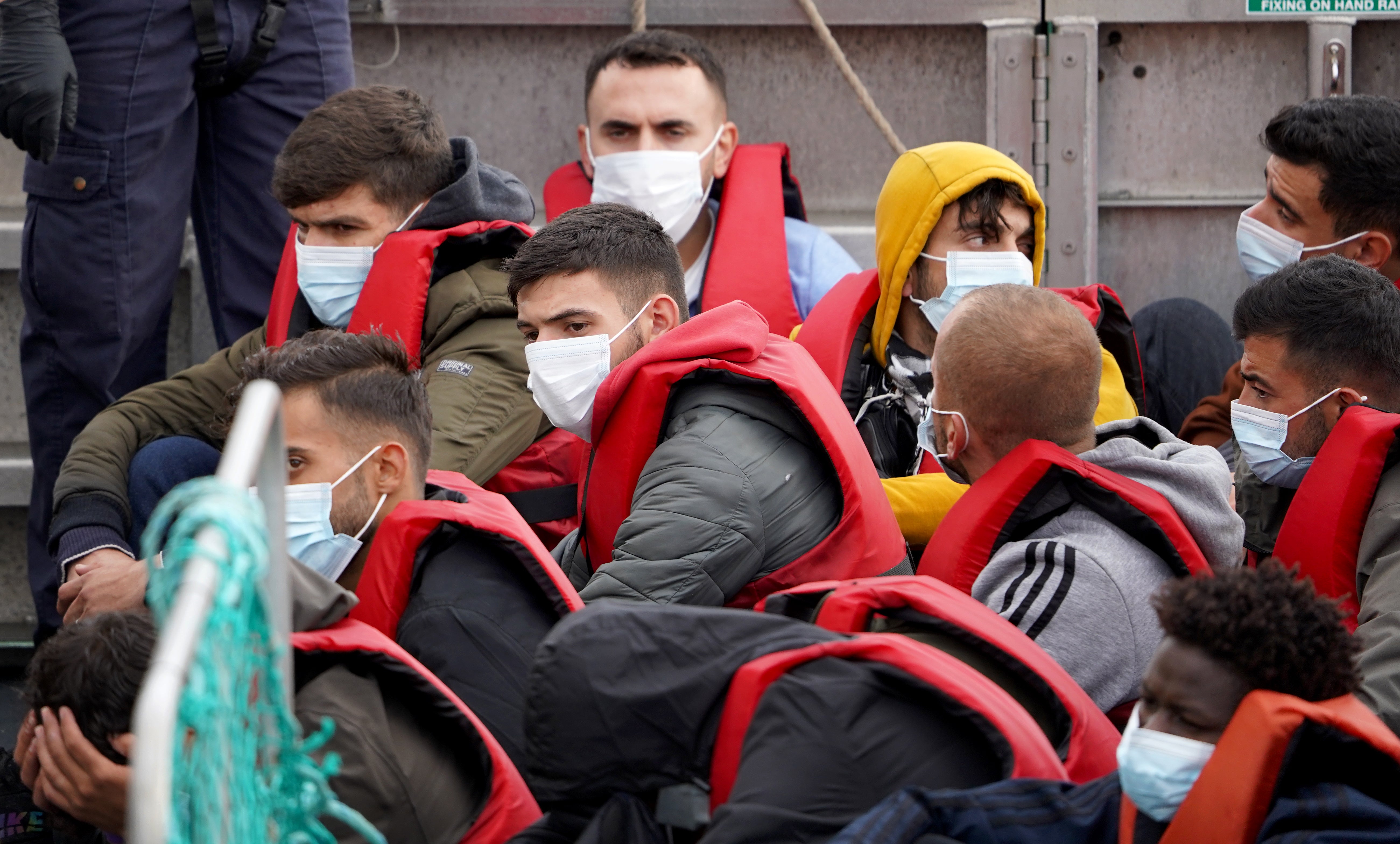 A group of people thought to be migrants, are brought in to Dover, Kent, from a Border Force vessel (Gareth Fuller/PA)