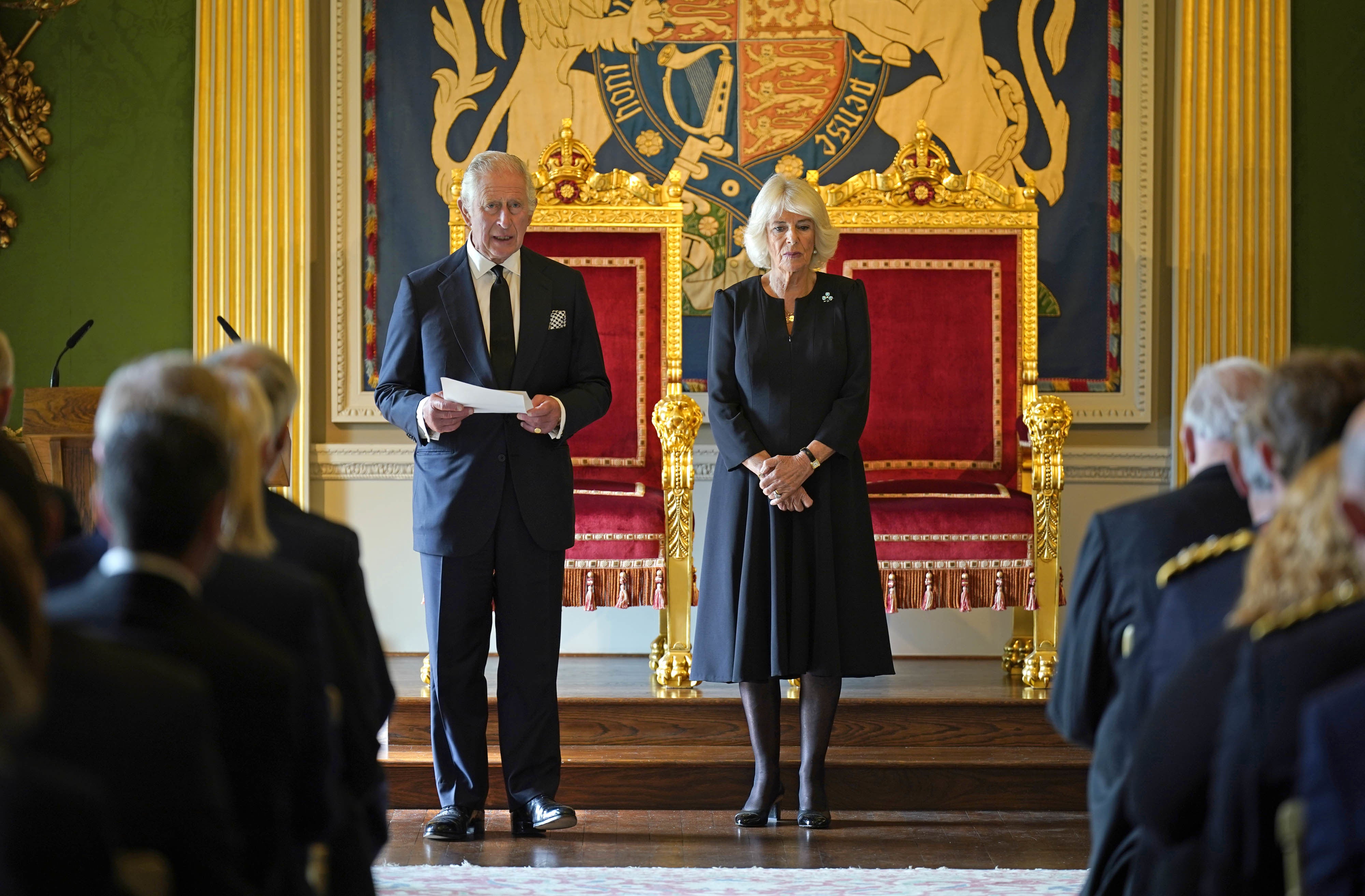 King Charles III, with the Queen Consort, speaking after receiving a message of condolence by Alex Maskey, the Speaker of the Northern Ireland Assembly, at Hillsborough Castle, Co Down (Niall Carson/PA)