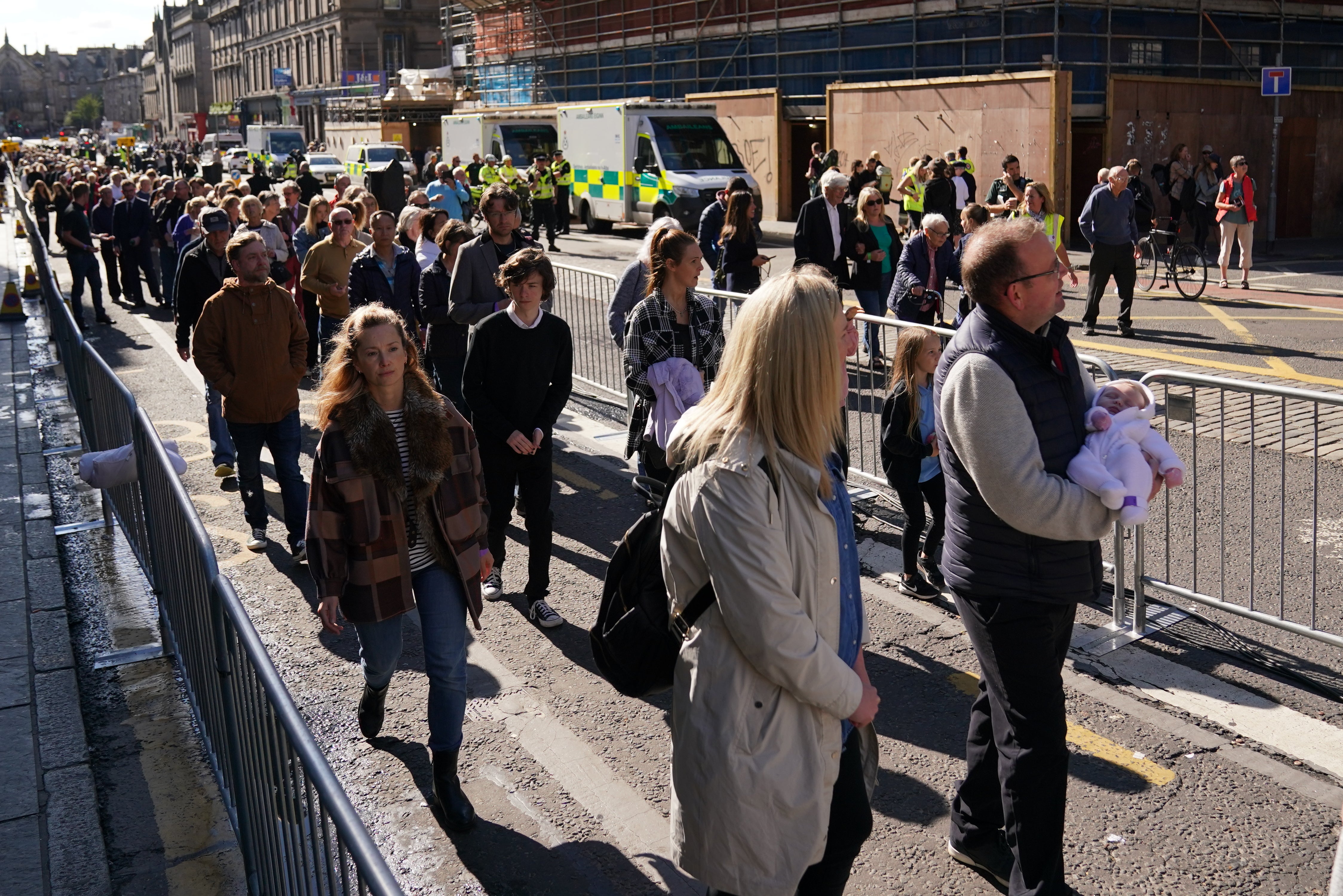 Members of the public queue to pay their respects to the Queen in St Giles’ Cathedral, Edinburgh (Jacob King/PA)