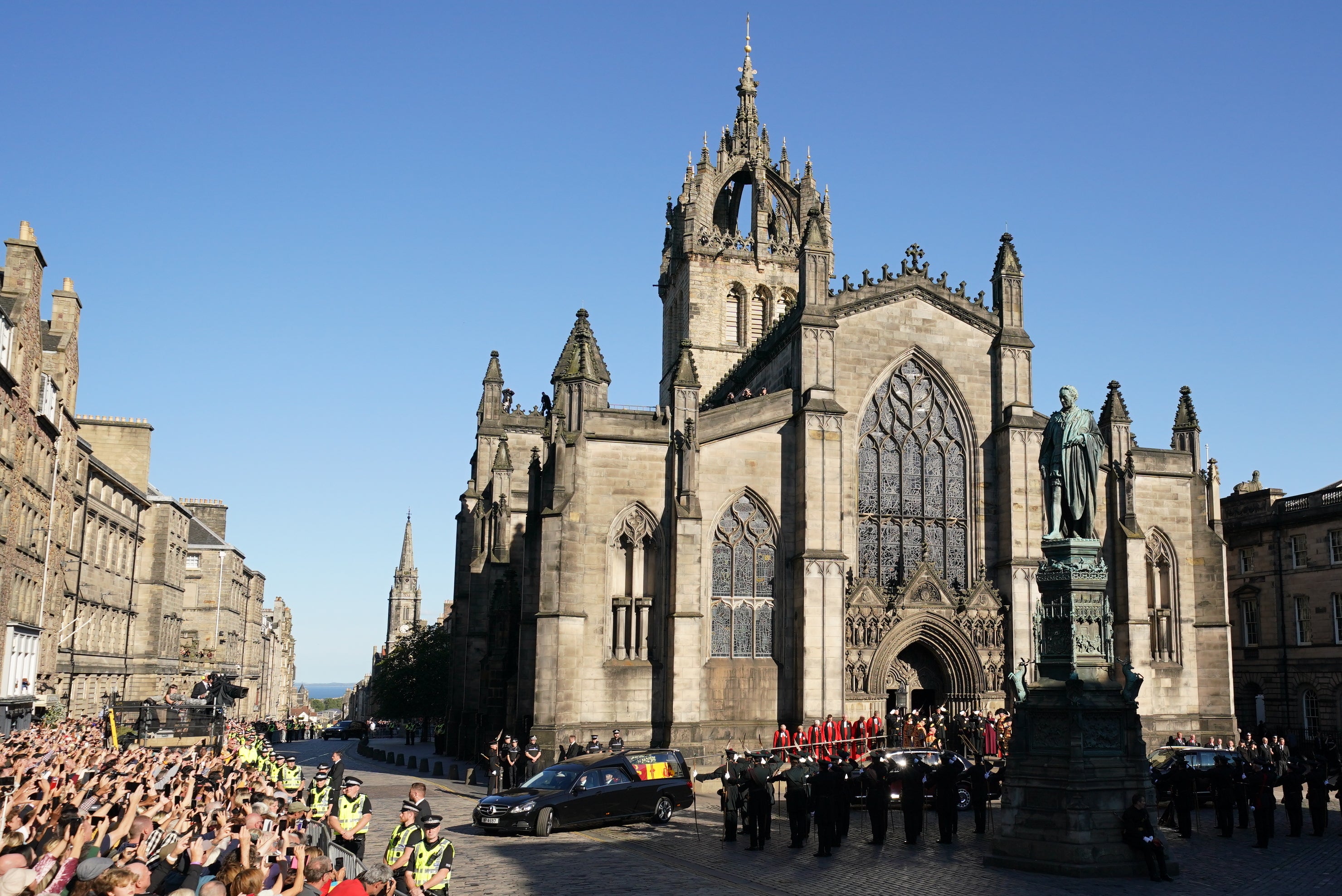 Applause was heard as the hearse carrying the coffin left St Giles’ Cathedral (Jacob King/PA)