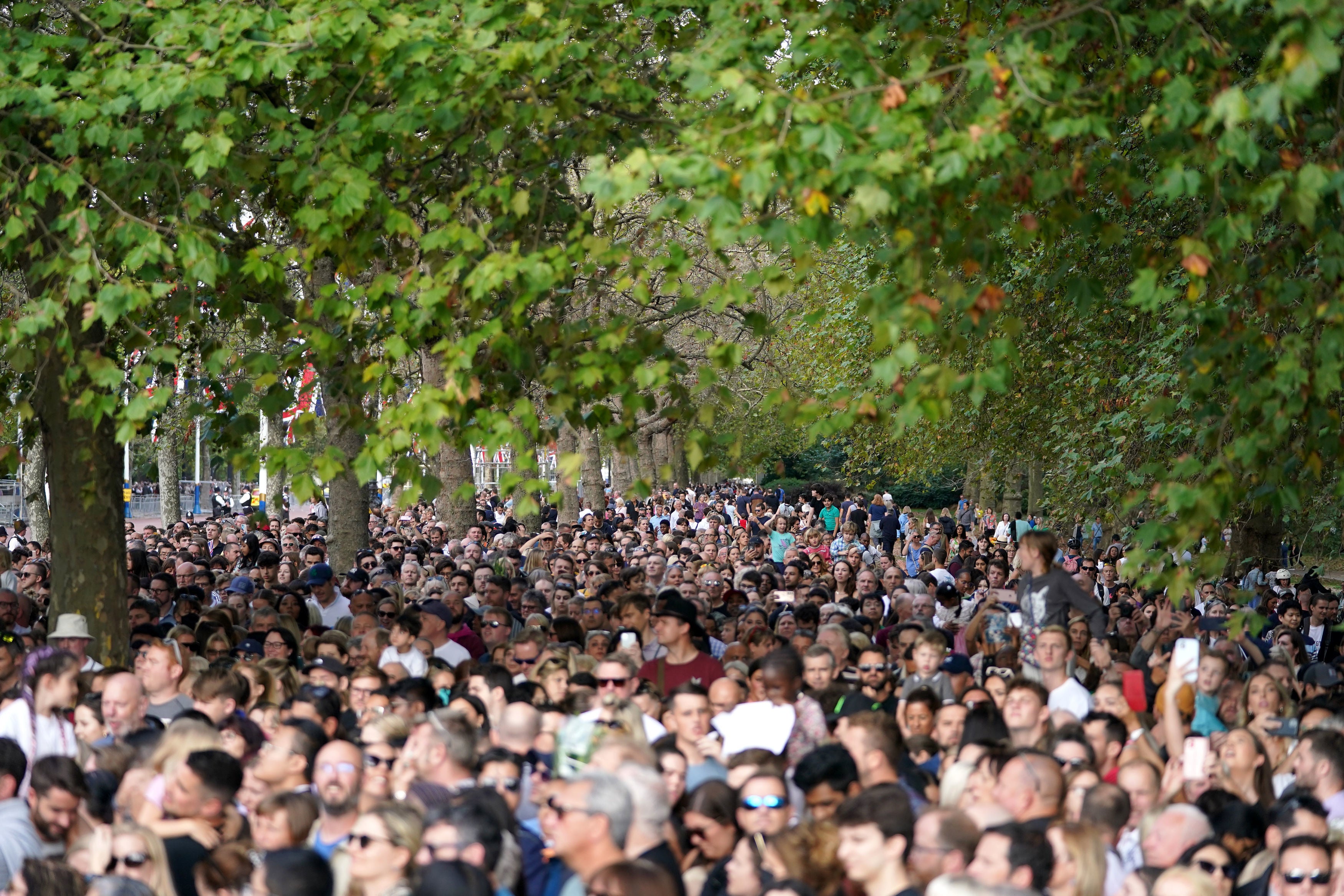 People queue along the mall at Buckingham Palace, London, following the death of Queen Elizabeth II last week.