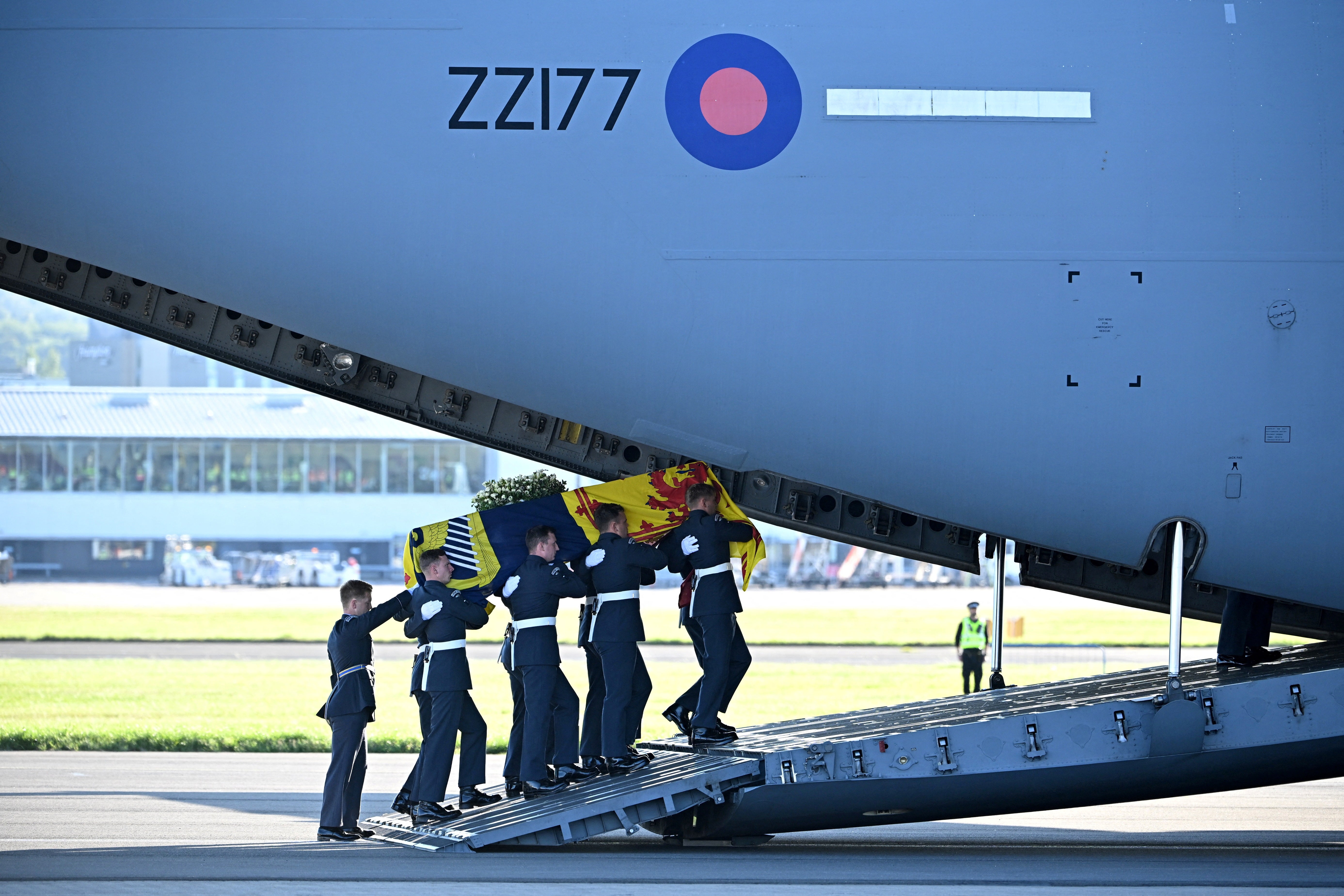 Pallbearers from the Queen’s Colour Squadron of the Royal Air Force carry the coffin