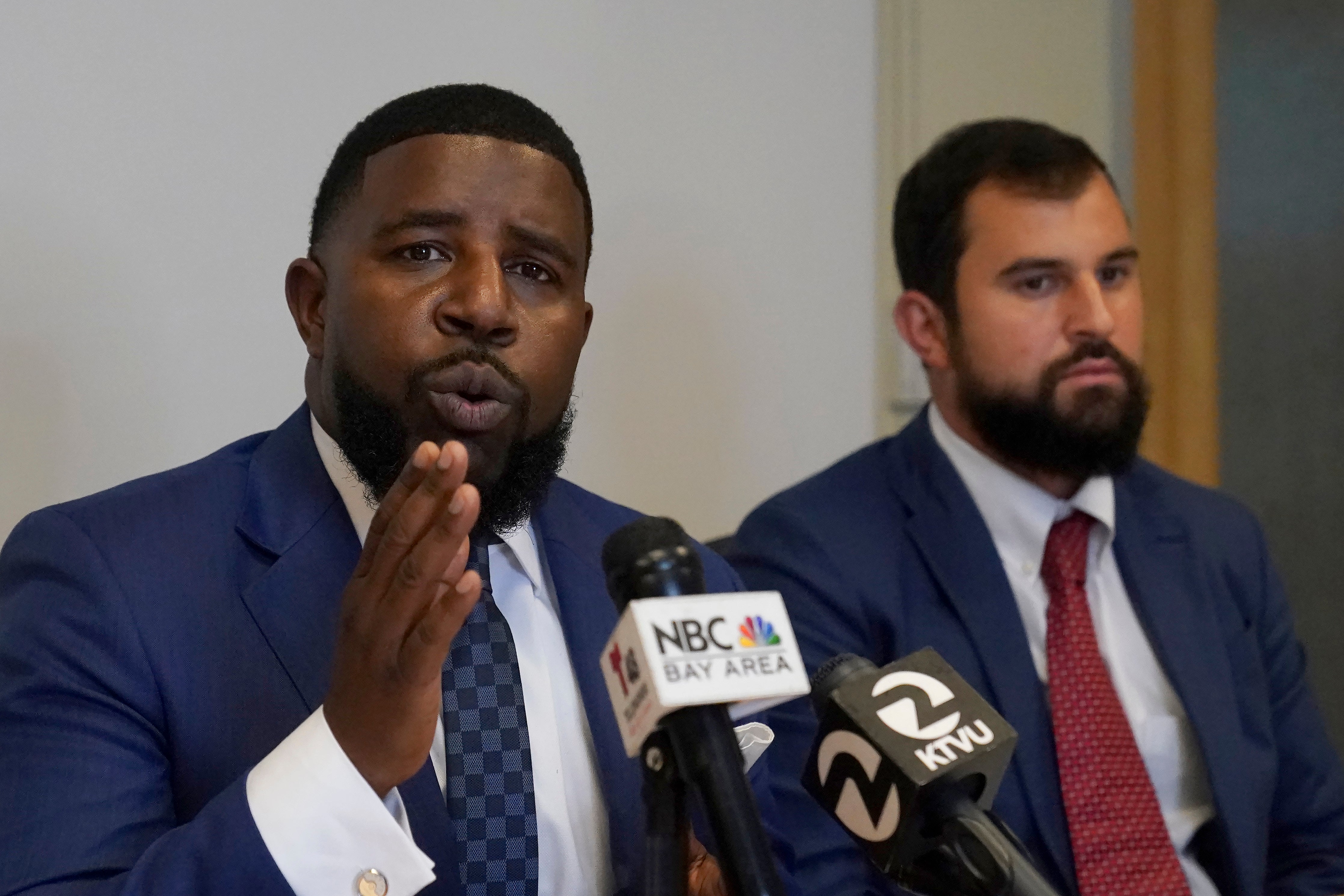 Attorneys Adante Pointer, left, and Patrick Buelna represent the rape survivor in a federal lawsuit against San Francisco