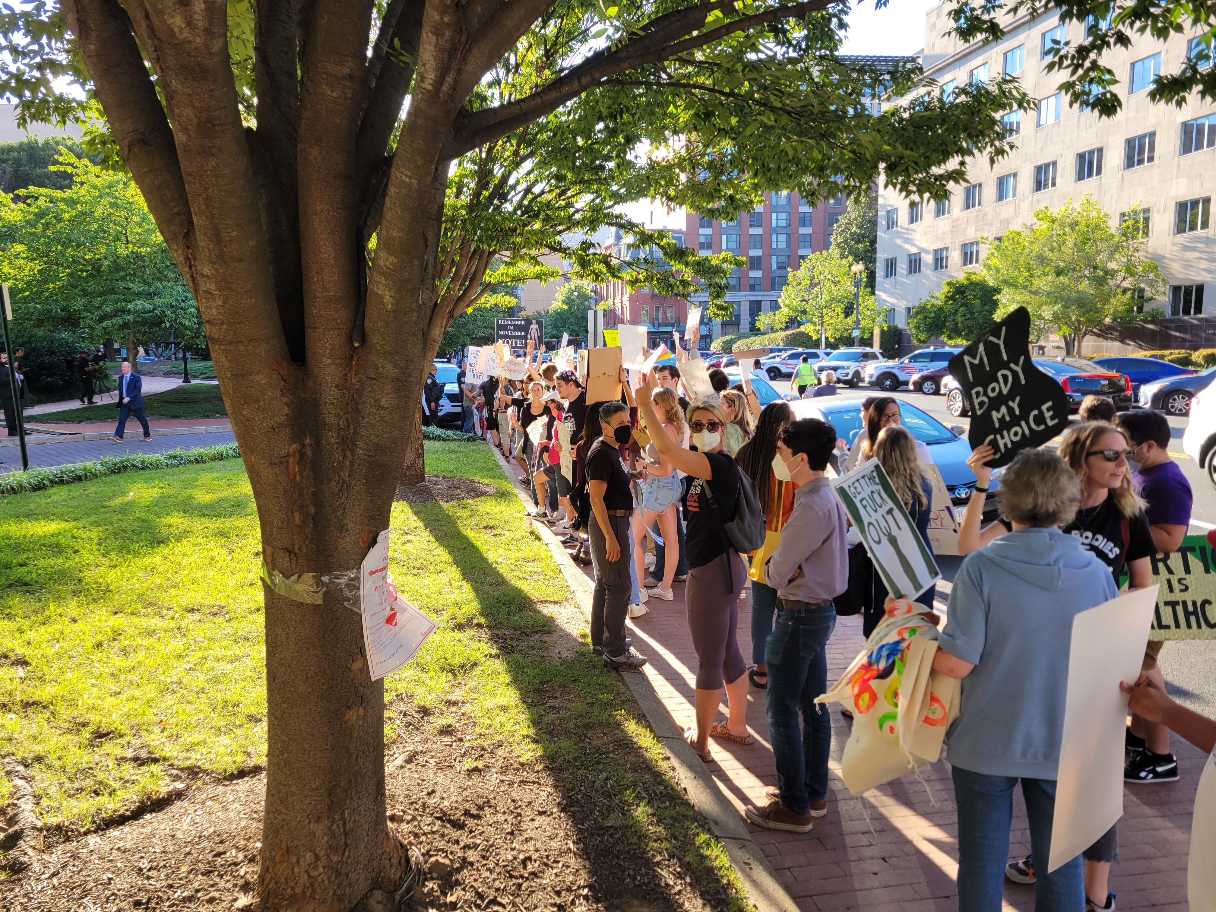 Protesters heckle GOP senators outside of the National Building Museum