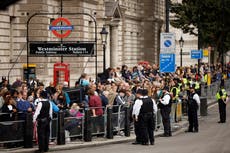 Heavy rain to clear as mourners queue to see Queen’s coffin