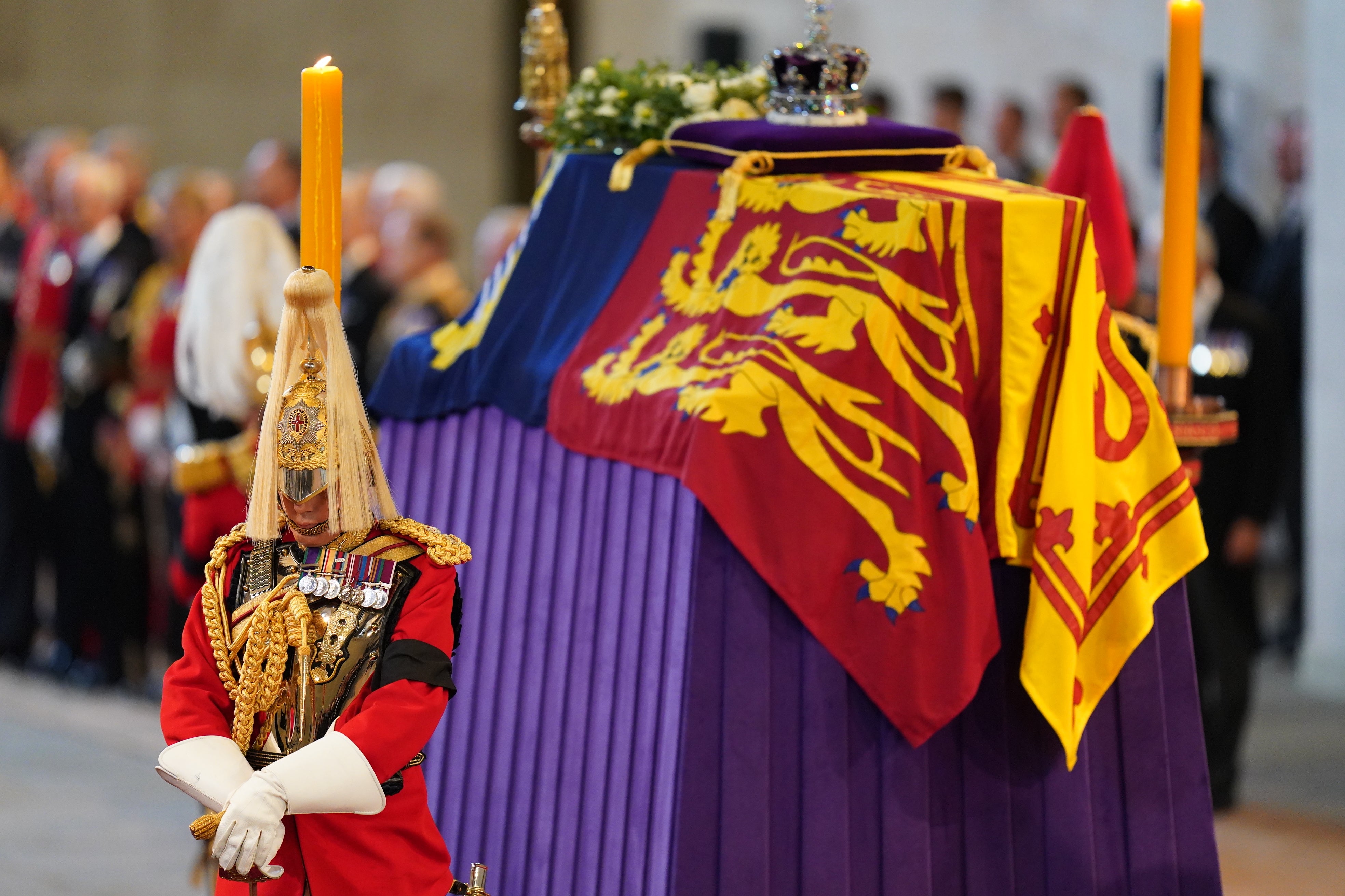 Four officers from the Household Cavalry guard the Queen’s coffin in 2022