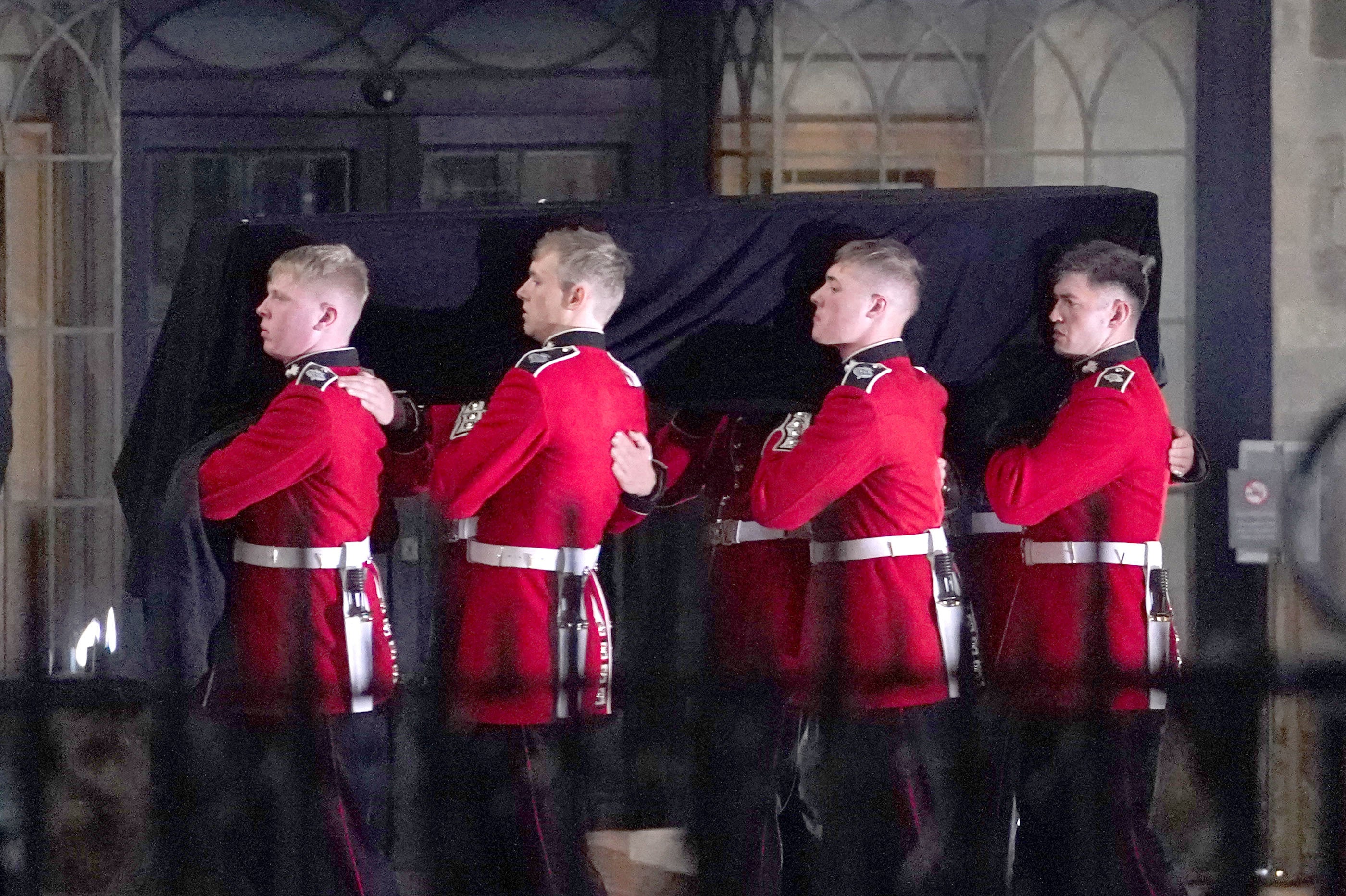 Members of the military take part during an early-morning rehearsal for the funeral of Queen Elizabeth II in London (Gareth Fuller/PA)