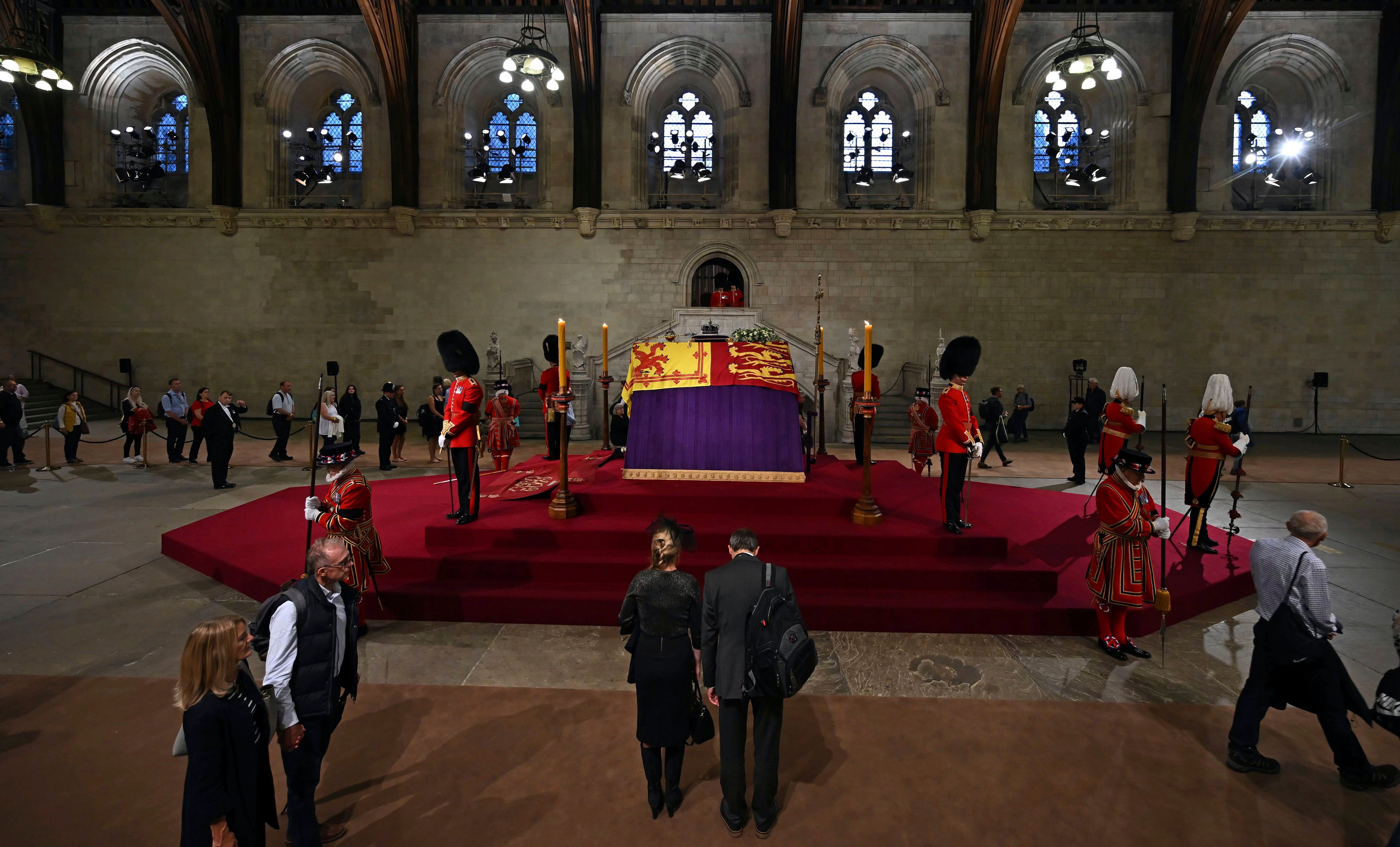 Members of the public file past the coffin of Queen Elizabeth II