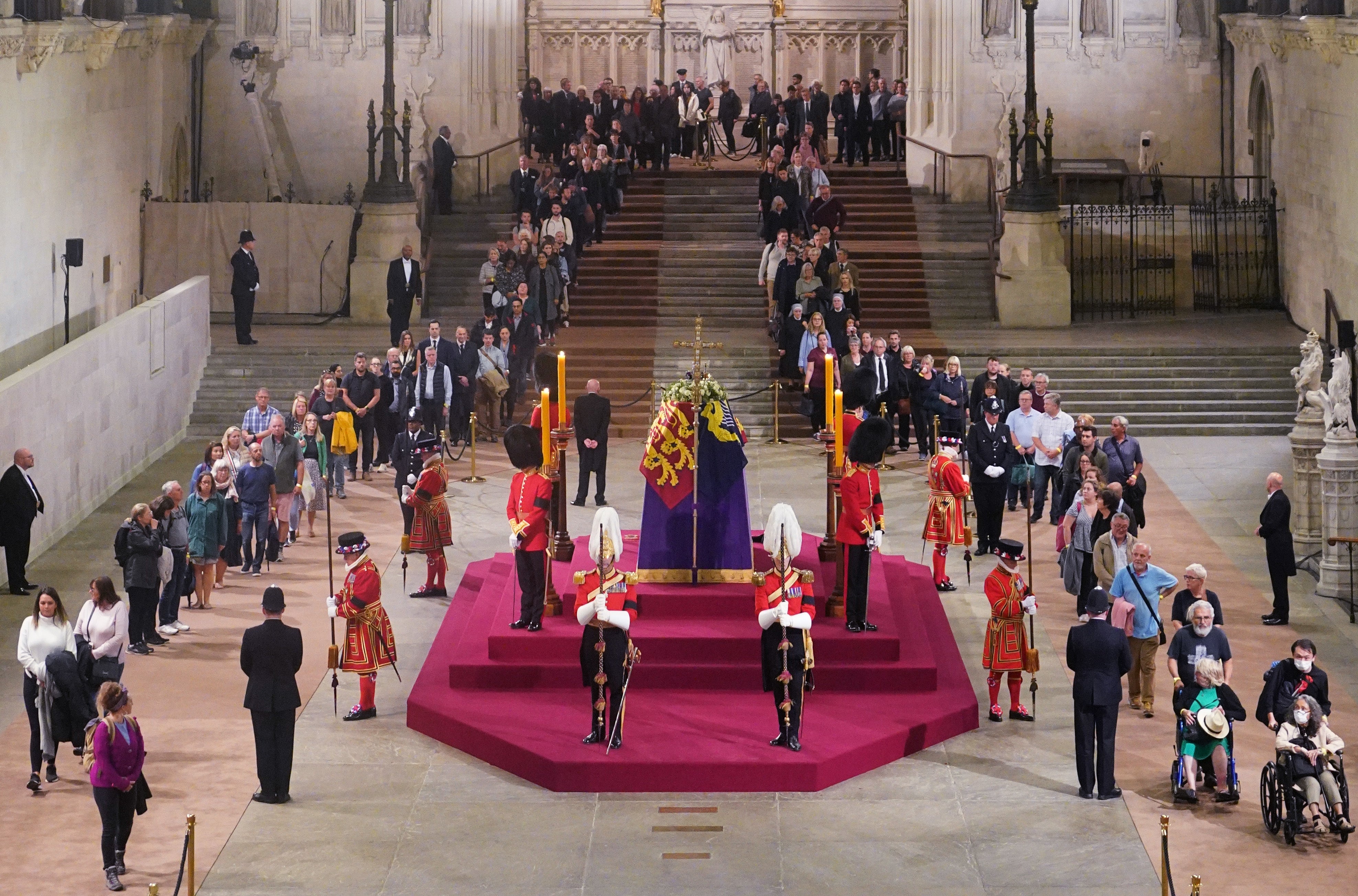 The first members of the public pay their respects at Westminster Hall (Yui Mok/PA)