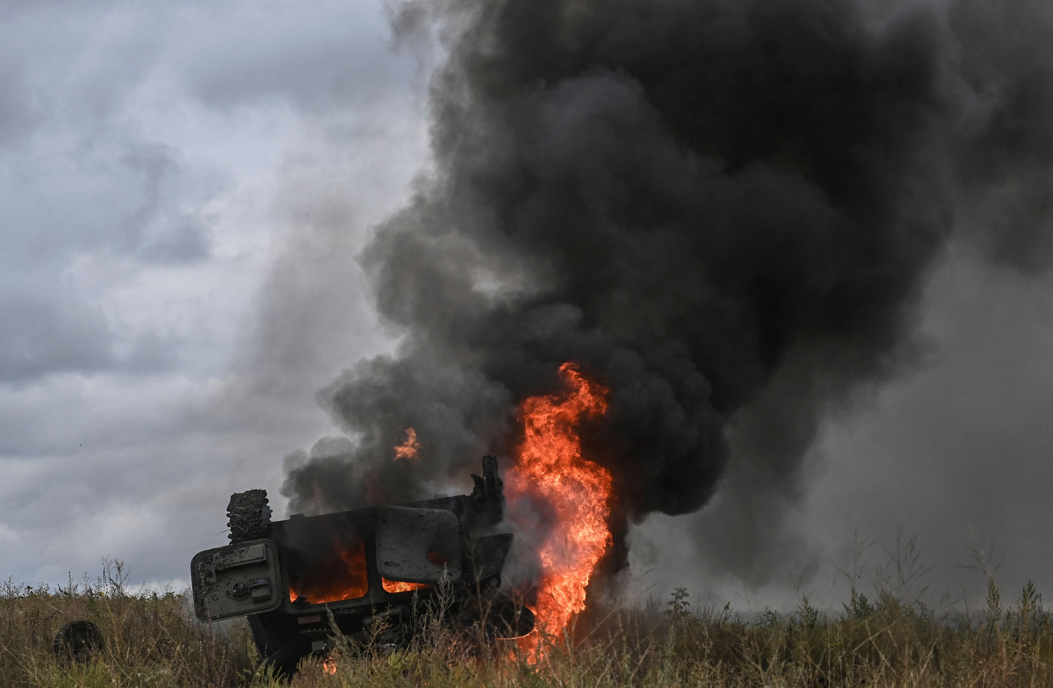 A destroyed Russian armoured personnel carrier on the outskirts of Izyum in September