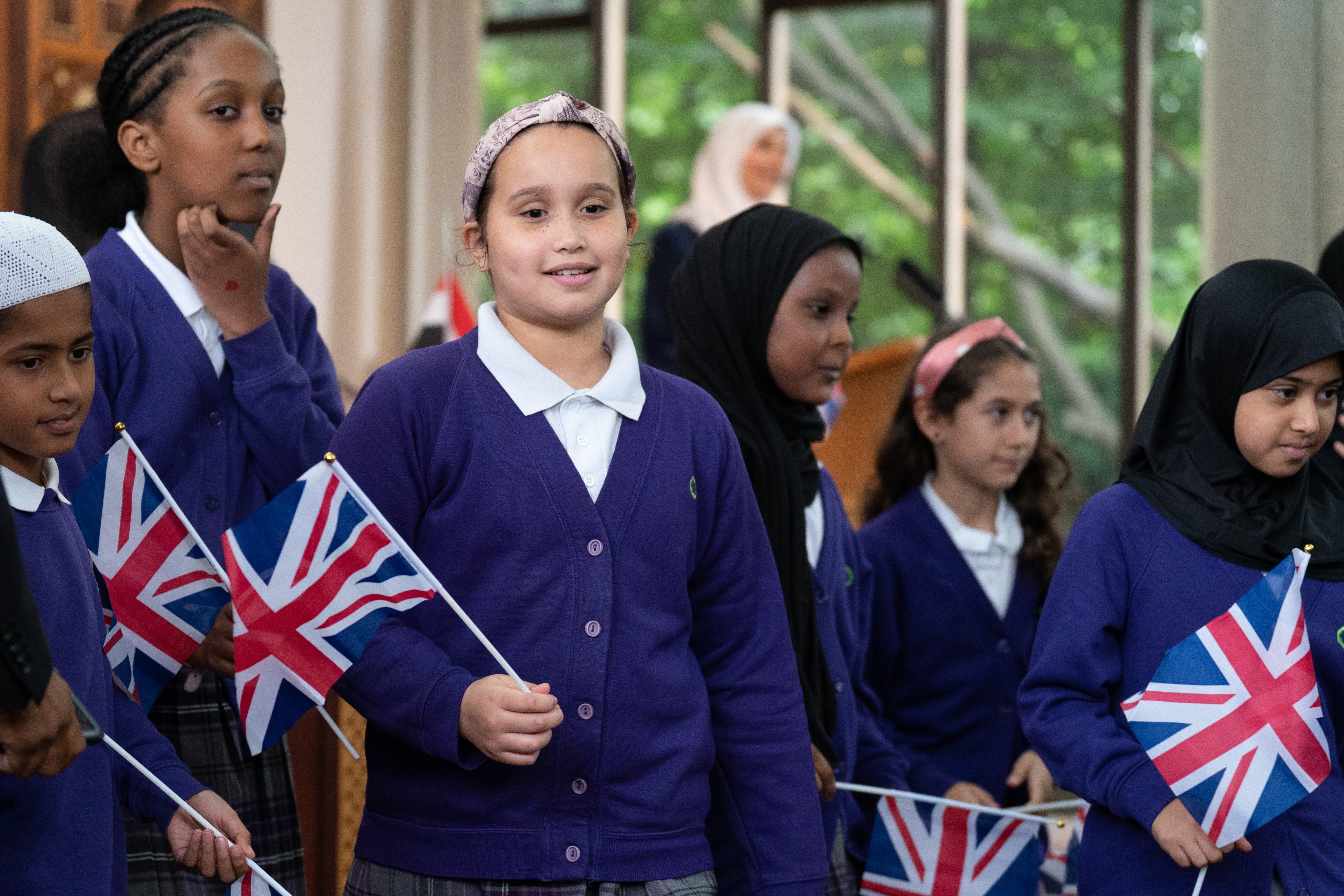 School children from London join Muslims from across the UK at Regent’s Park Mosque to honour the life of Queen Elizabeth II and to mark the accession of King, Charles III (Stefan Rousseau/PA)