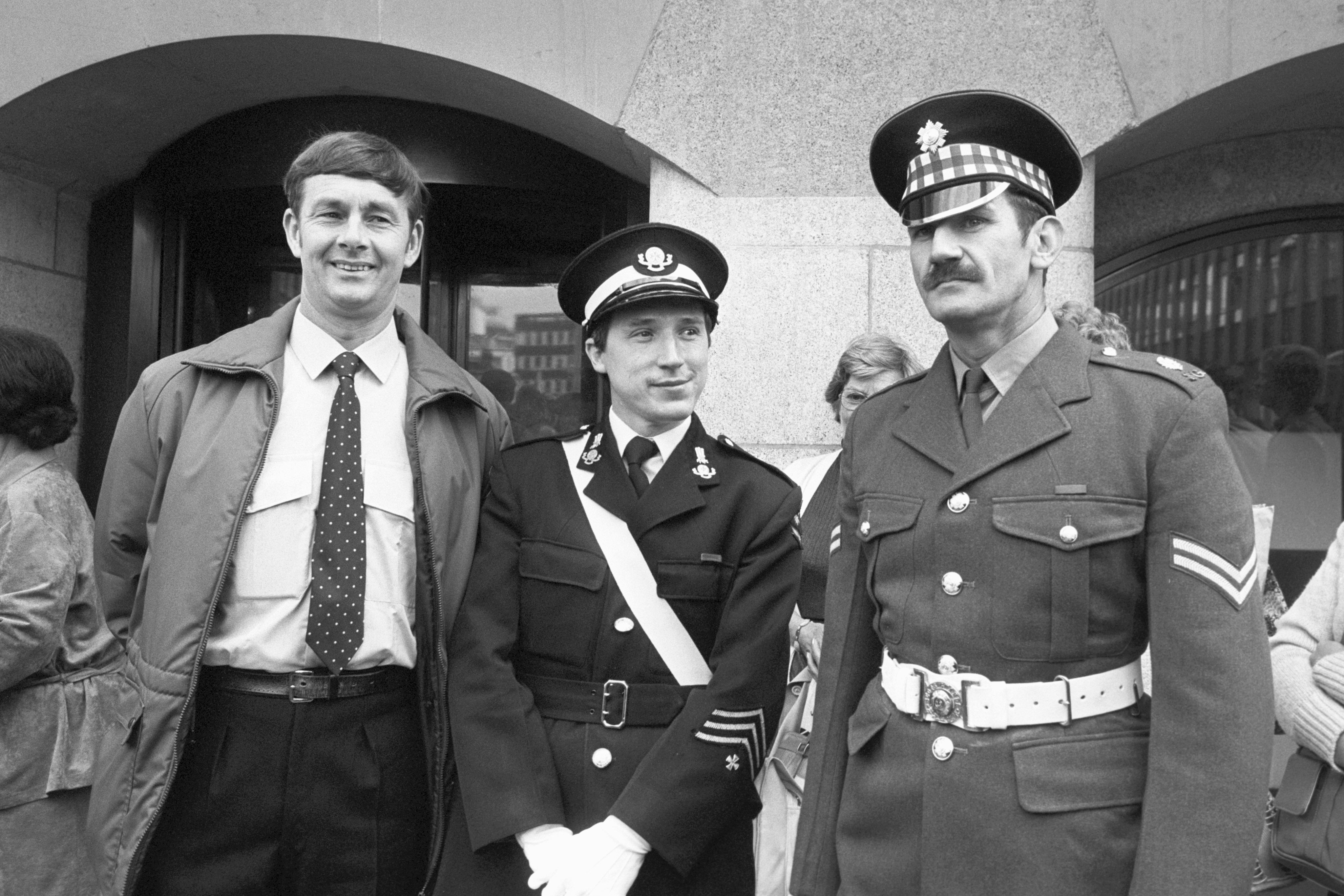 John Heasman, centre, was personally thanked by the Queen following his heroics (PA)