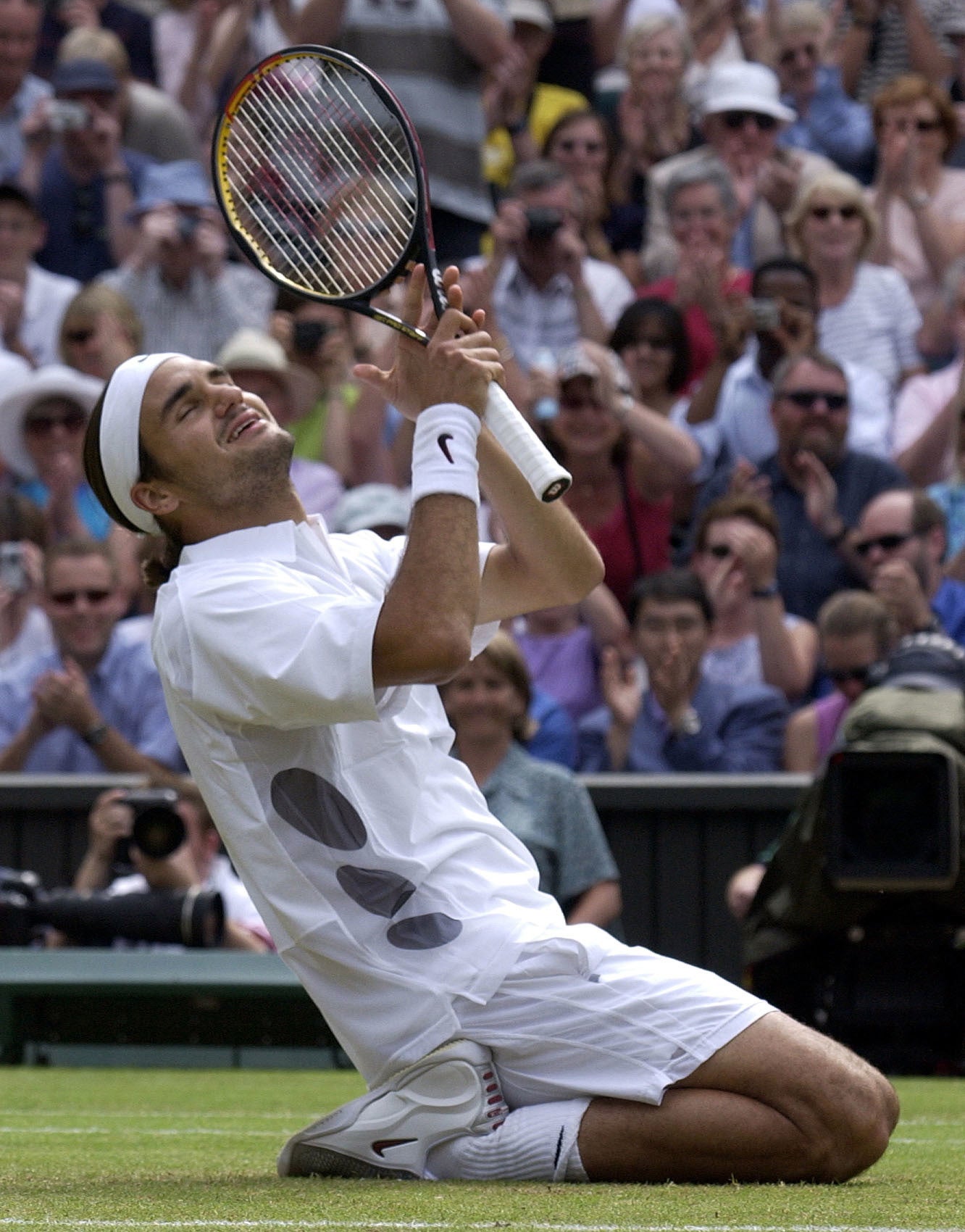 Roger Federer’s first Grand Slam title was the men’s singles at Wimbledon in 2003 (PA)