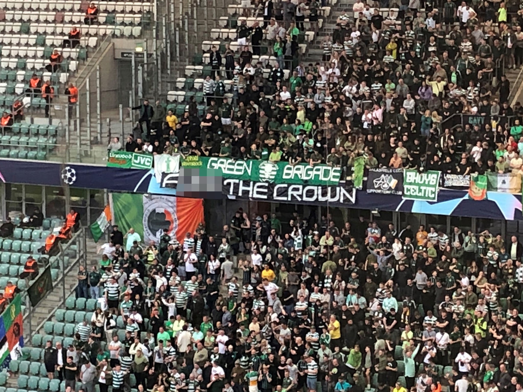 The banners appeared at a match against Shakhtar Donetsk in Poland