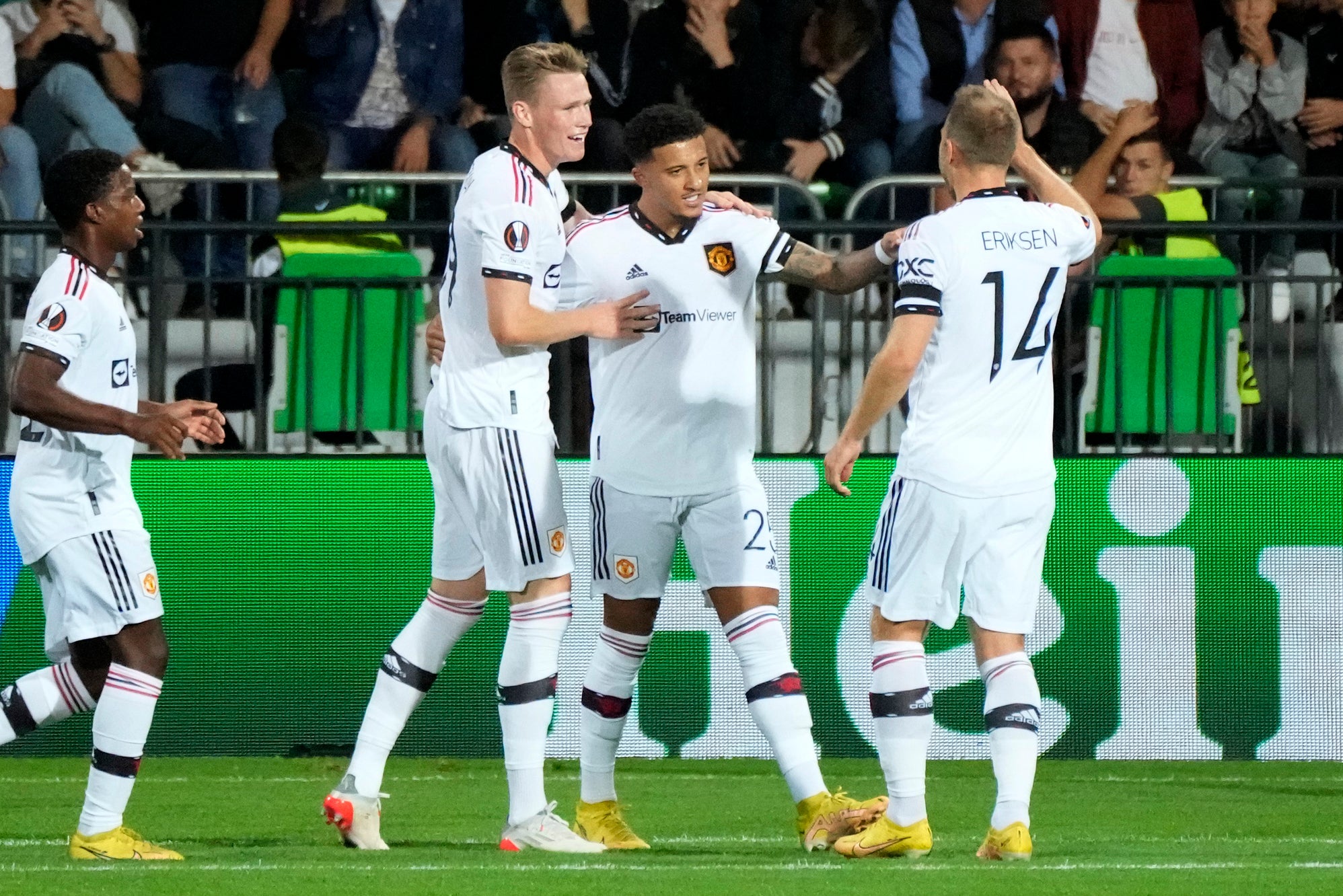 Sancho (second from right) put United ahead (Sergei Grits/AP)