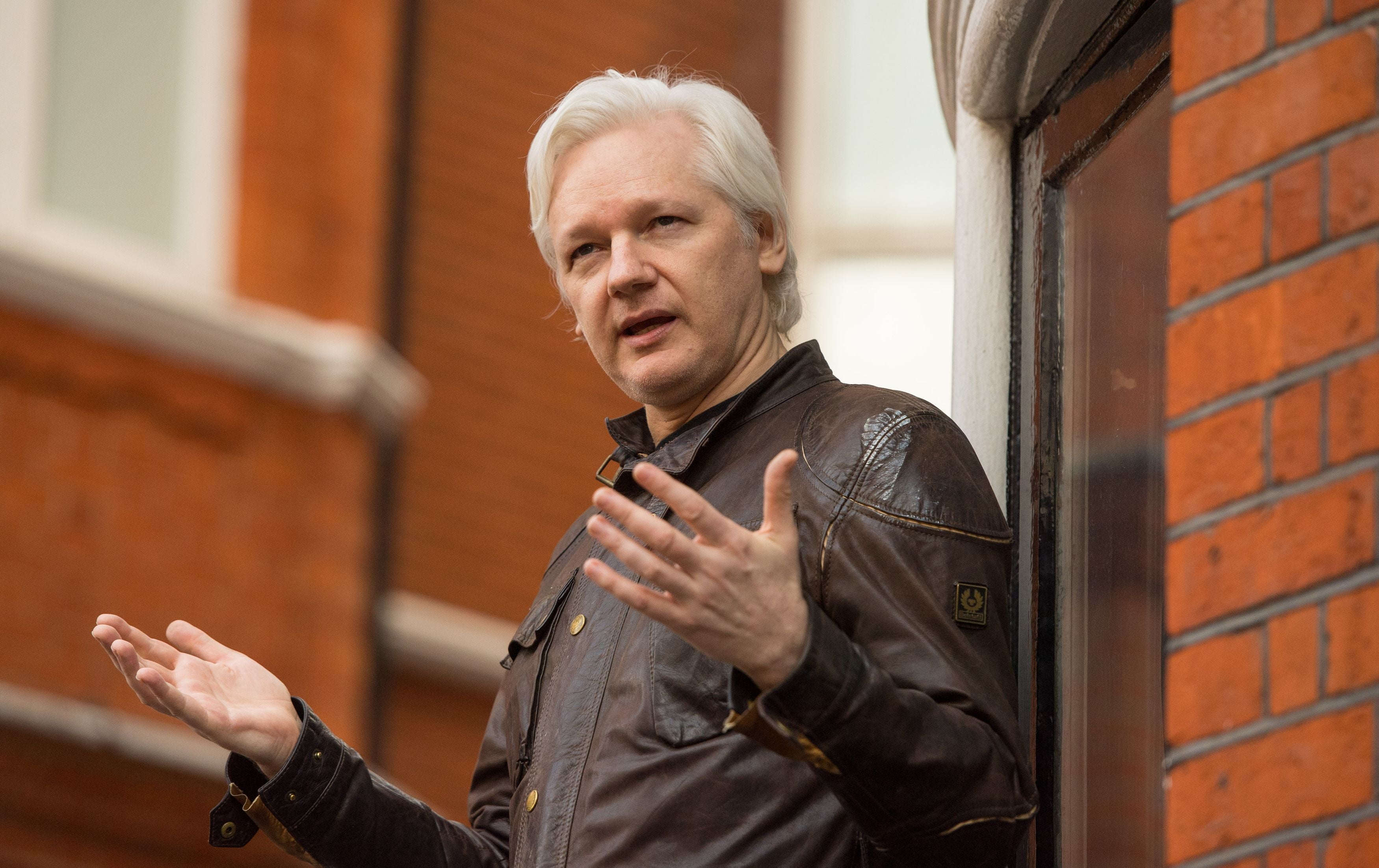 Julian Assange speaking from the balcony of the Ecuadorian embassy in London in 2017. He has been given an award by Mexico (/PA)