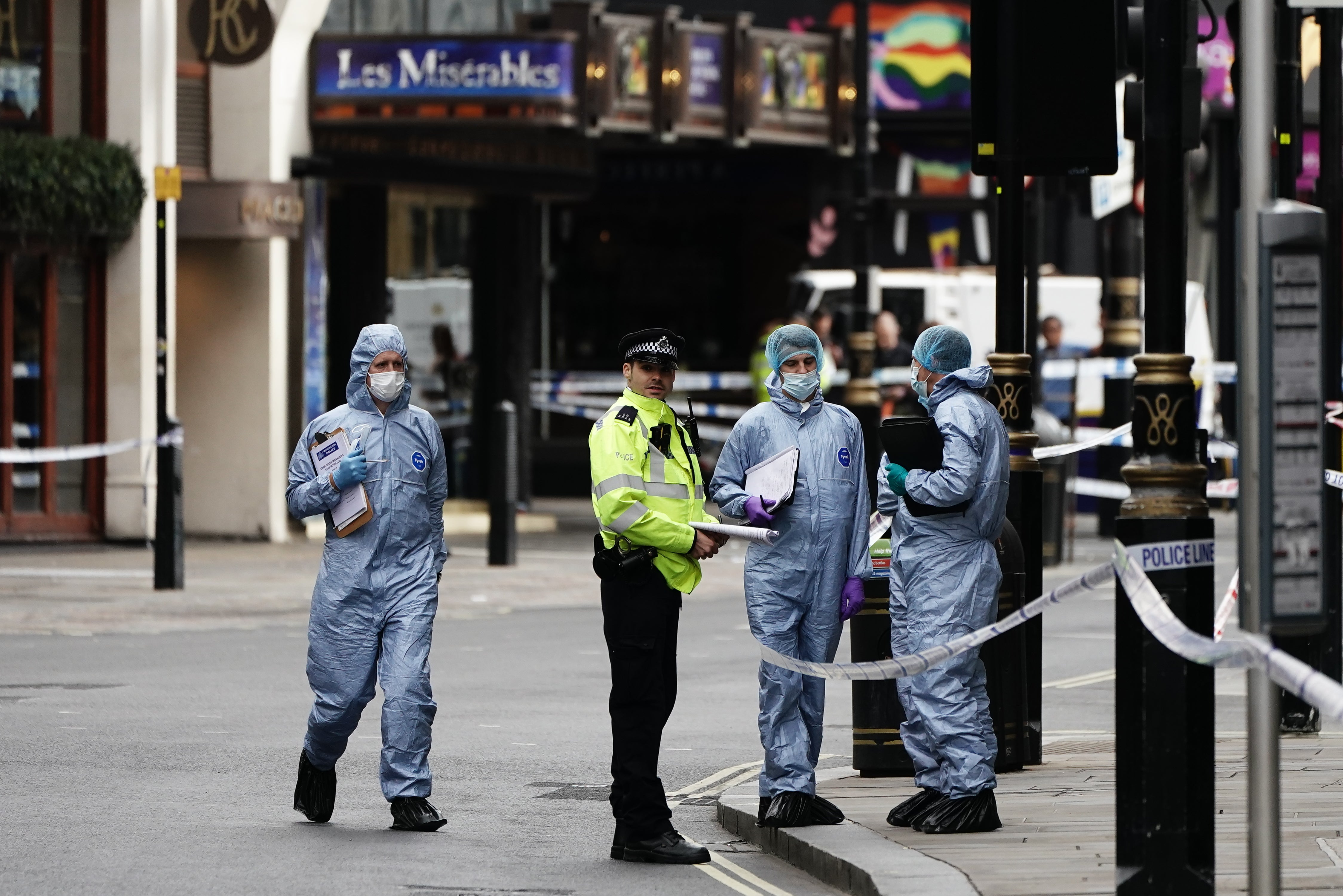 Forensics officers investigated as sections of the busy spot were cordoned off