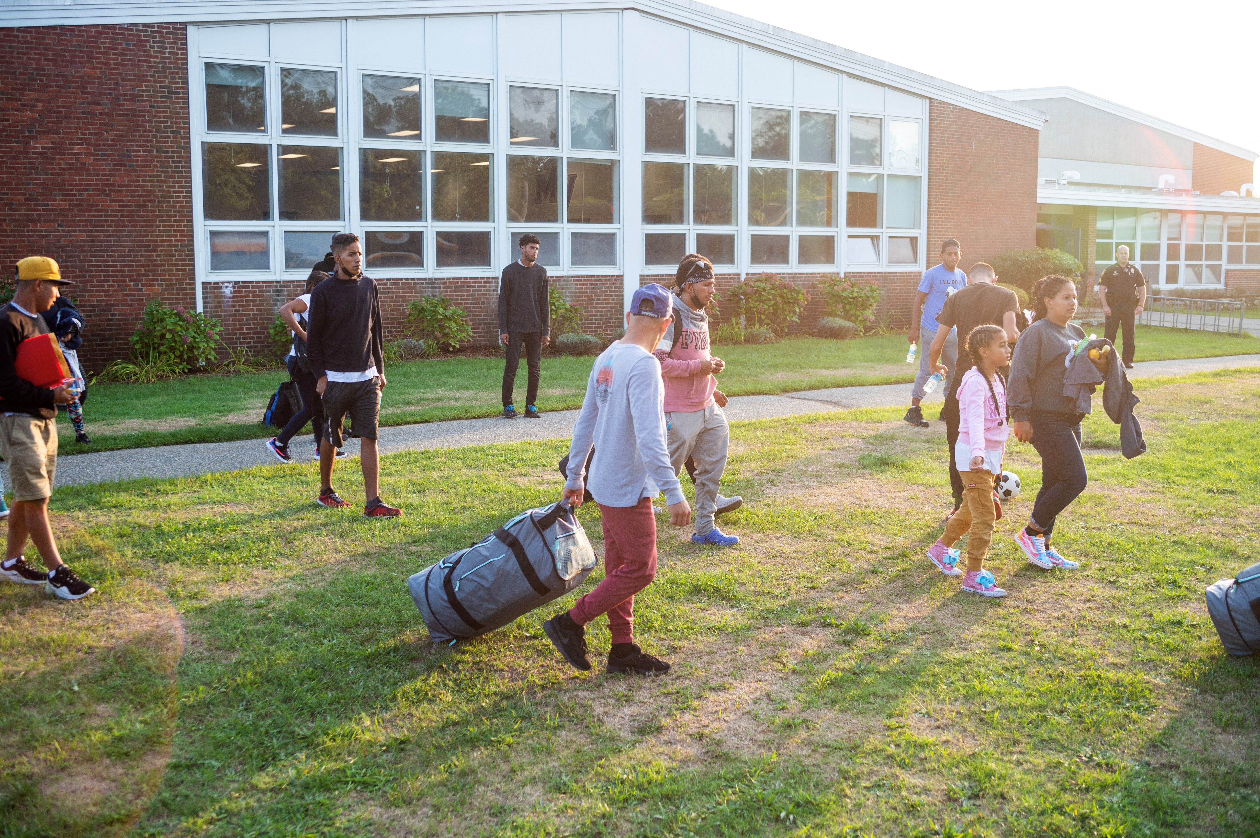 Venezuelan migrants are seen at the Martha’s Vineyard Regional High School in Massachusetts