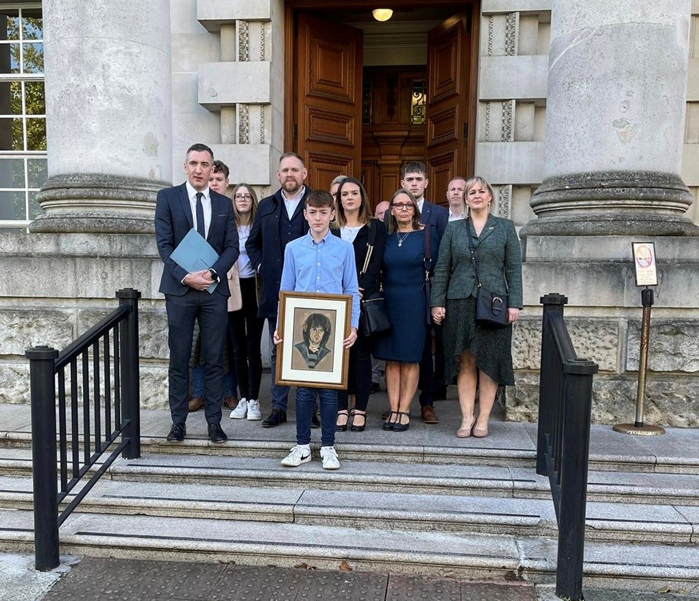 Members of Loughlin Maginn’s family outside Belfast High Court (Phoenix Law/PA)