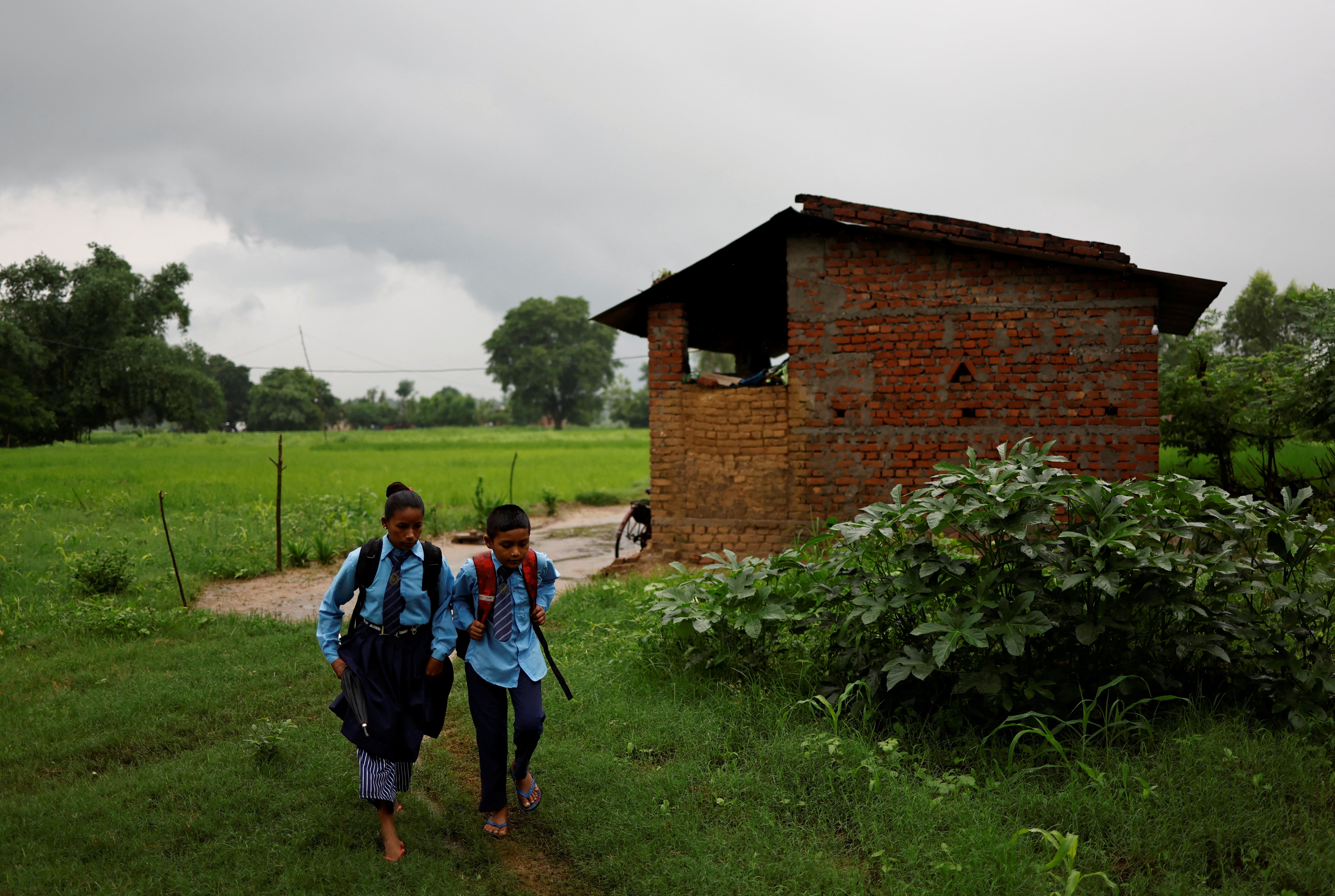 Parwati and Resham set off on their walk to school