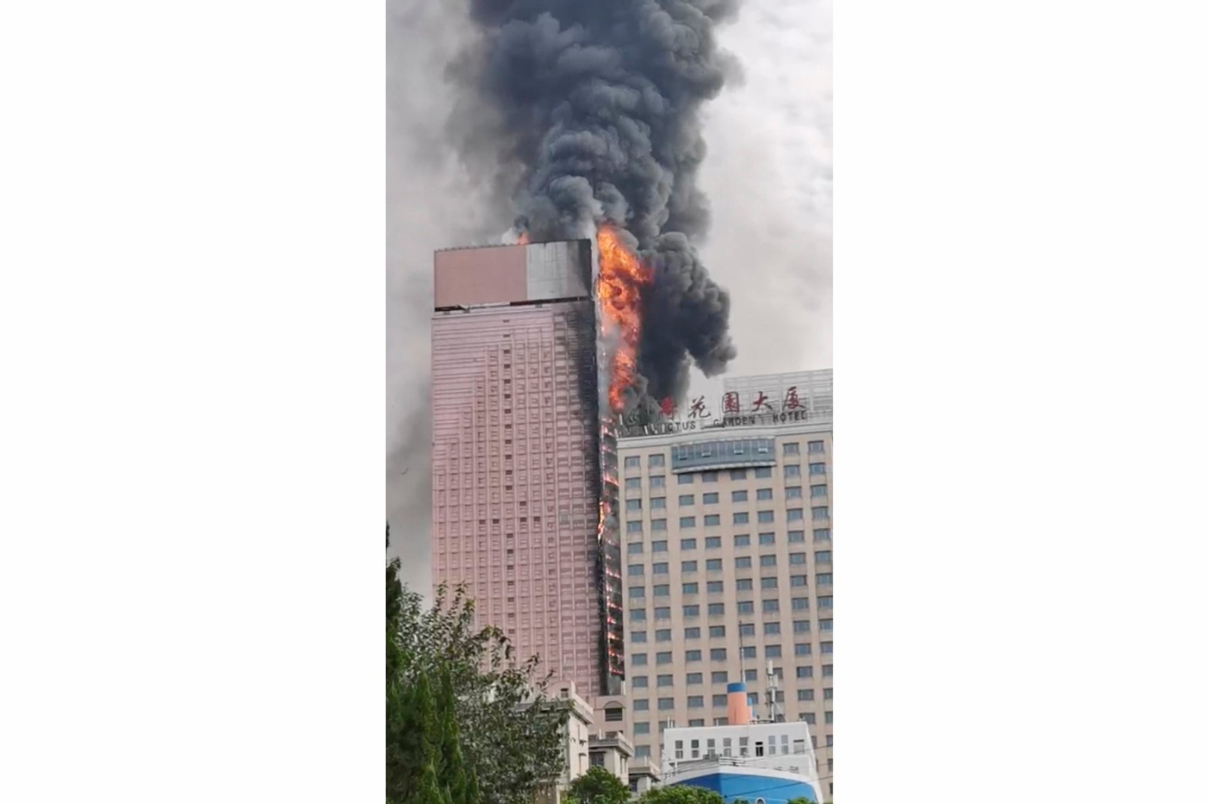 In this image taken from video, massive fire and plumes of smoke rise from a skyscraper on Friday, 16 September 2022, in China’s Changsha city in Hunan province