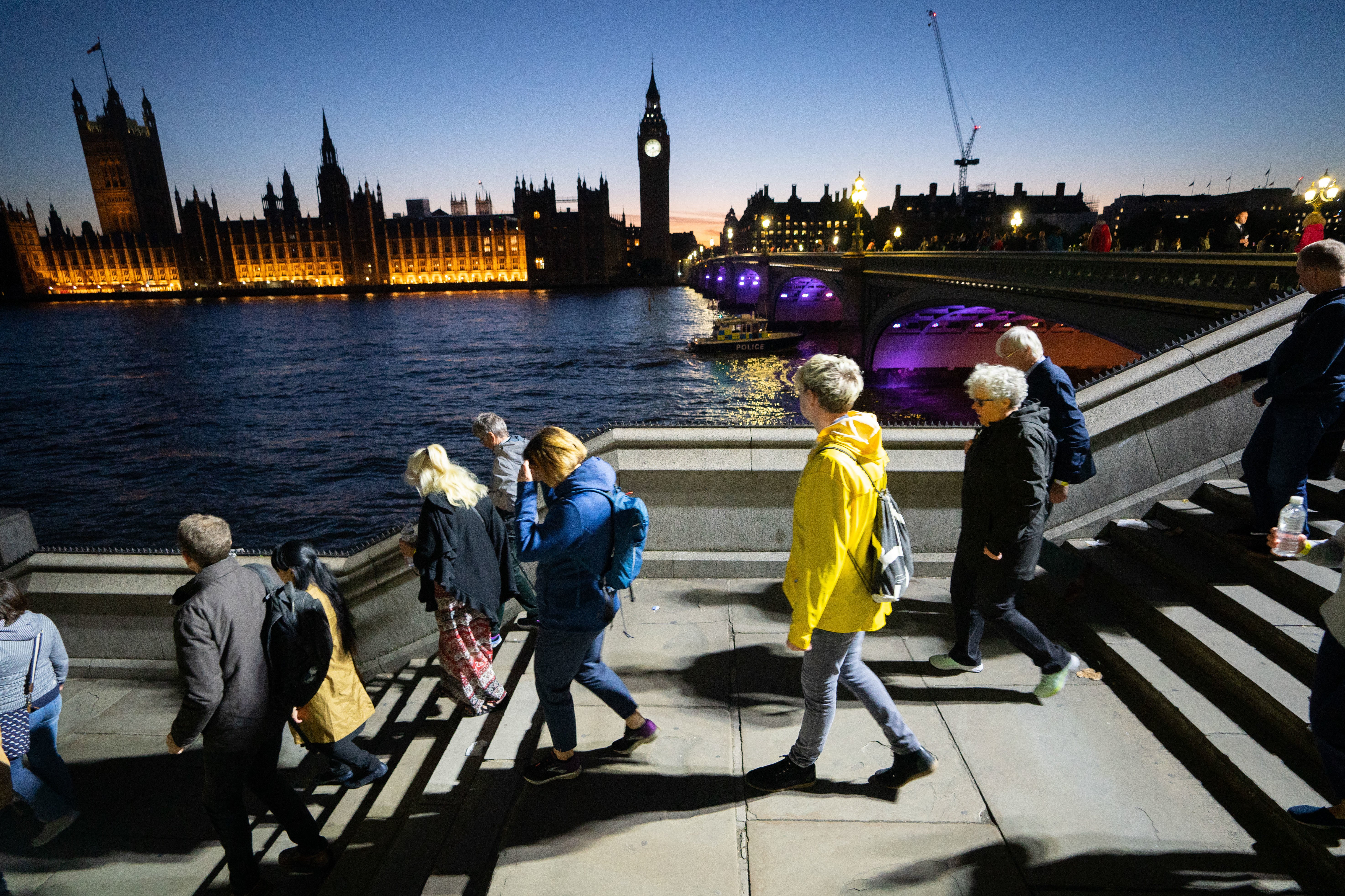 Queue time tick over 25 hours as thousands brave the cold to mourn the Queen (James Manning/PA)