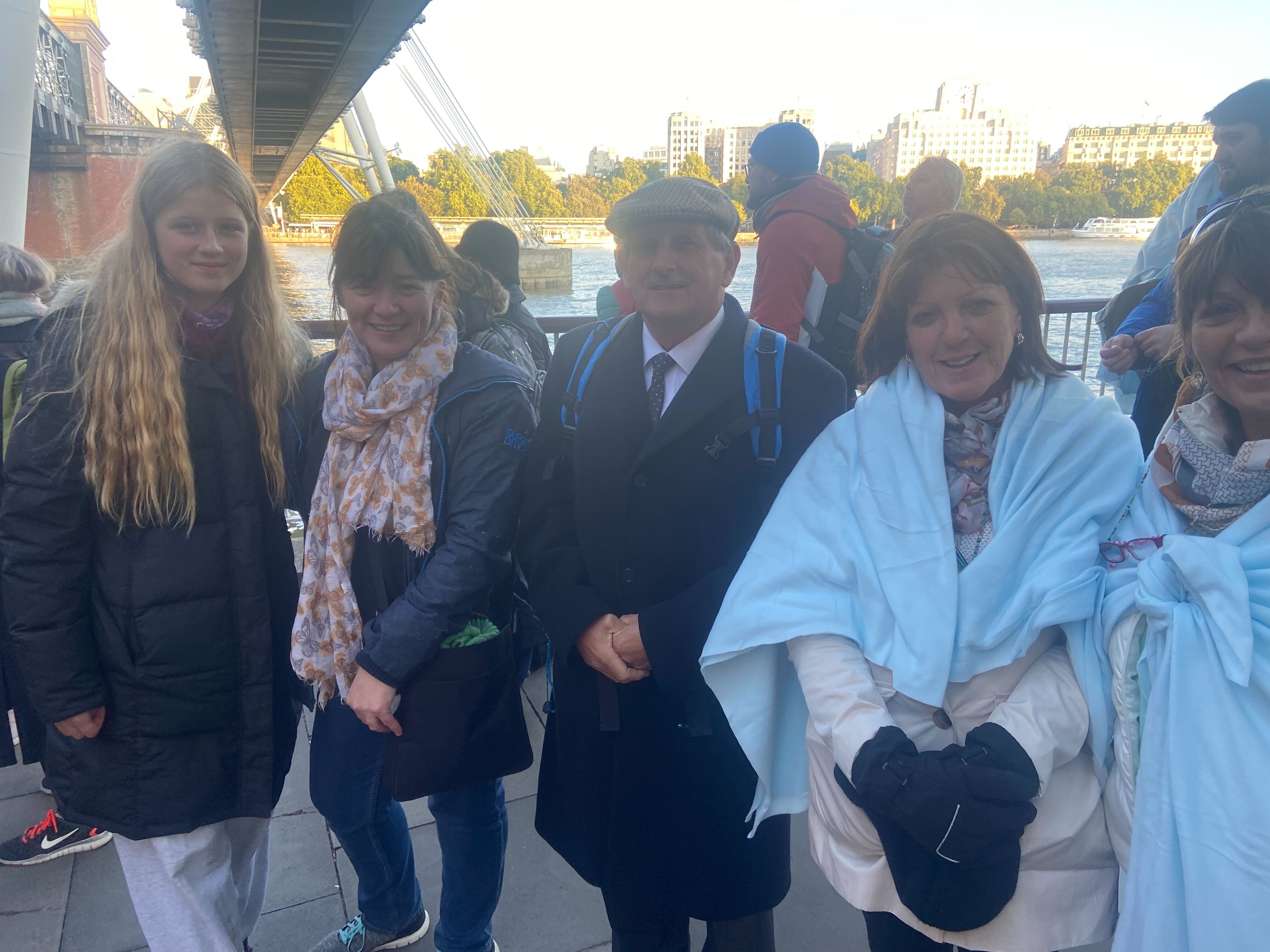 Seren Toye, Sandra Mughal, Gordon Walker, Rosie McBride and Caroline Delaney (left to right) have waited through the night to see the Queen’s coffin