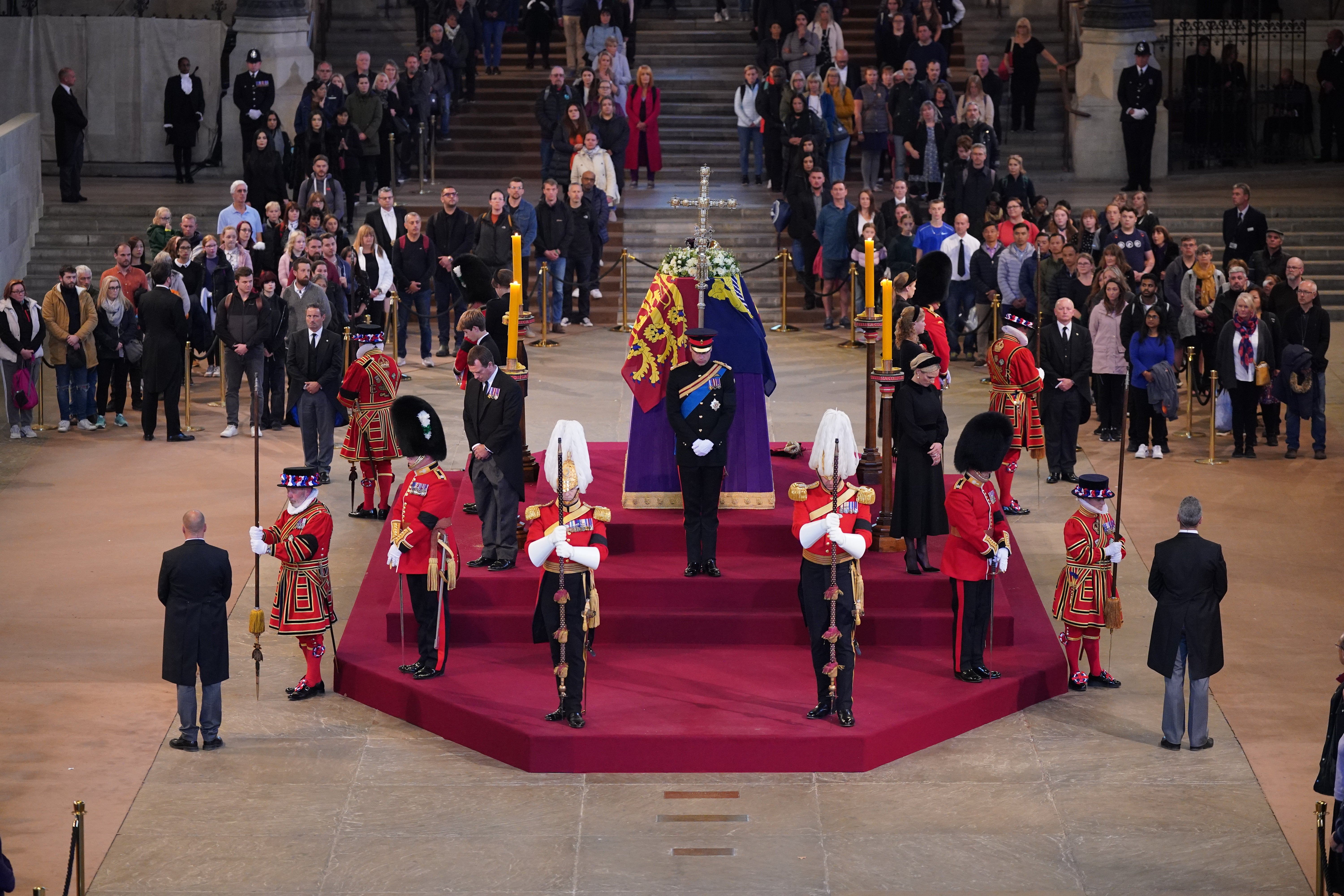 Queen Elizabeth II ‘s grandchildren hold a vigil beside the coffin of their grandmother (Aaron Chown/PA)