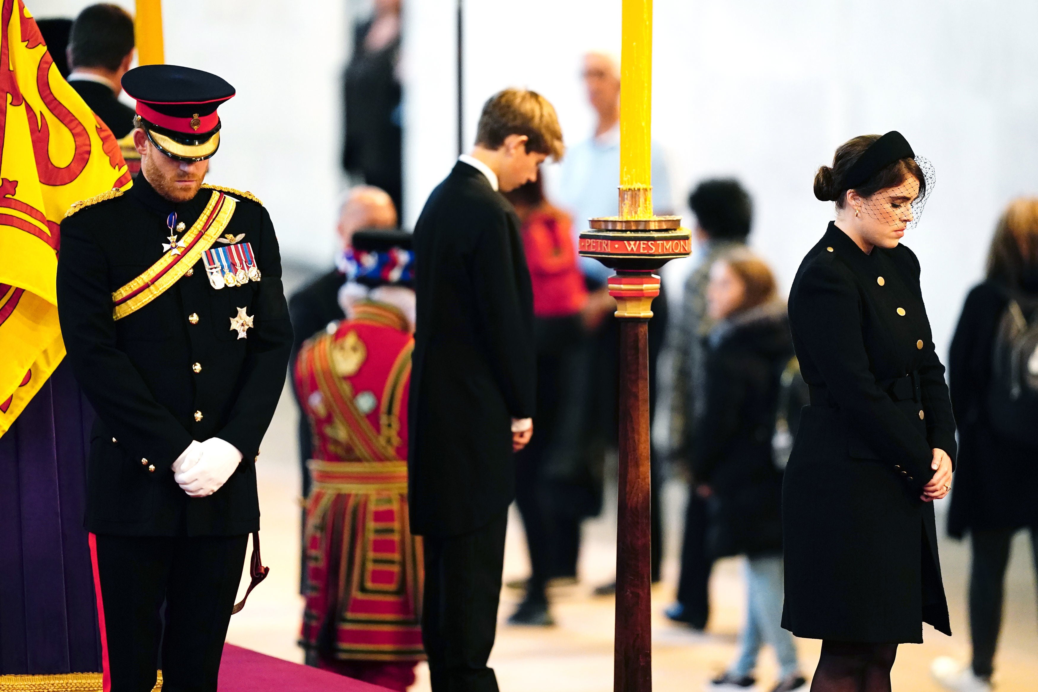 James, Viscount Severen, (centre) flanked by Princess Beatrice and Prince Harry during the vigil at Westminster Hall