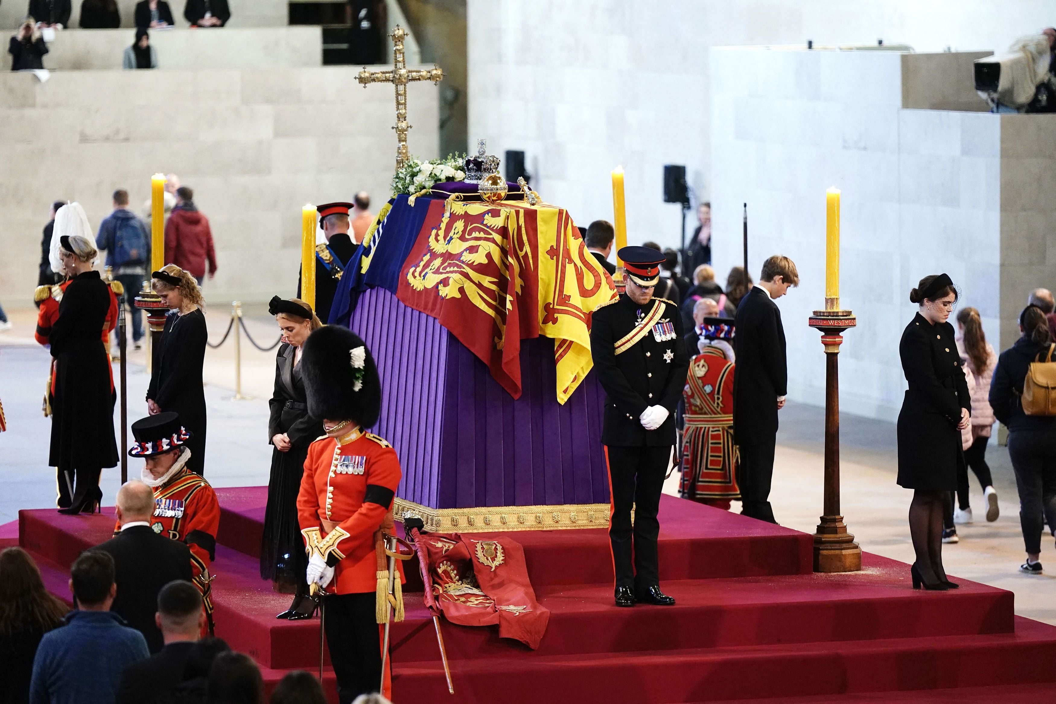 Queen Elizabeth’s grandchildren hold a vigil around her coffin in Westminster Hall