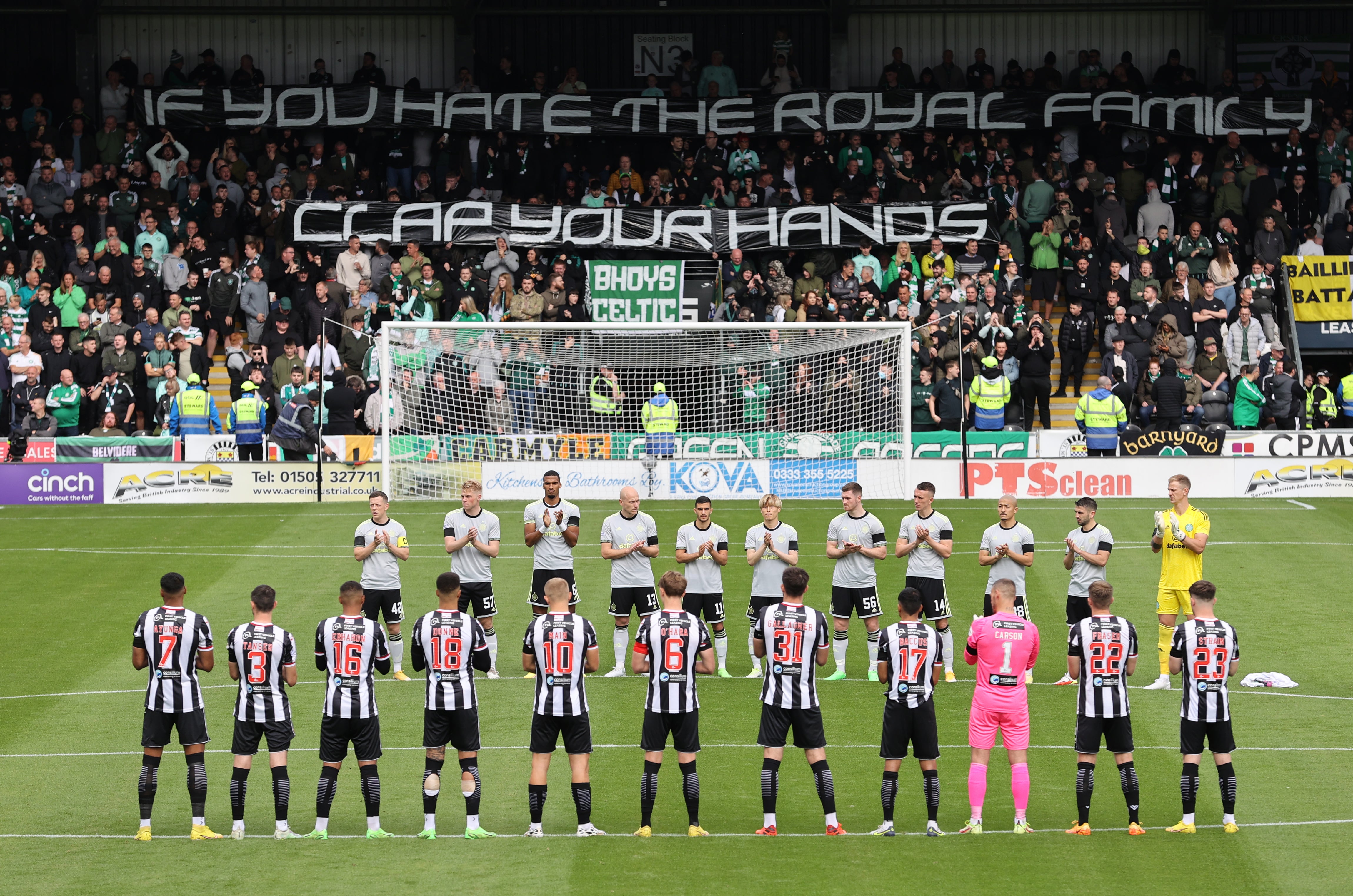 Celtic fans hold up a banner before the cinch Premiership match at St Mirren