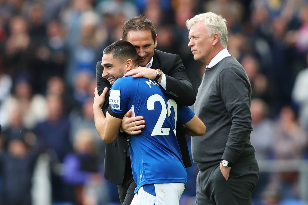 Frank Lampard celebrates with Maupay as David Moyes looks on