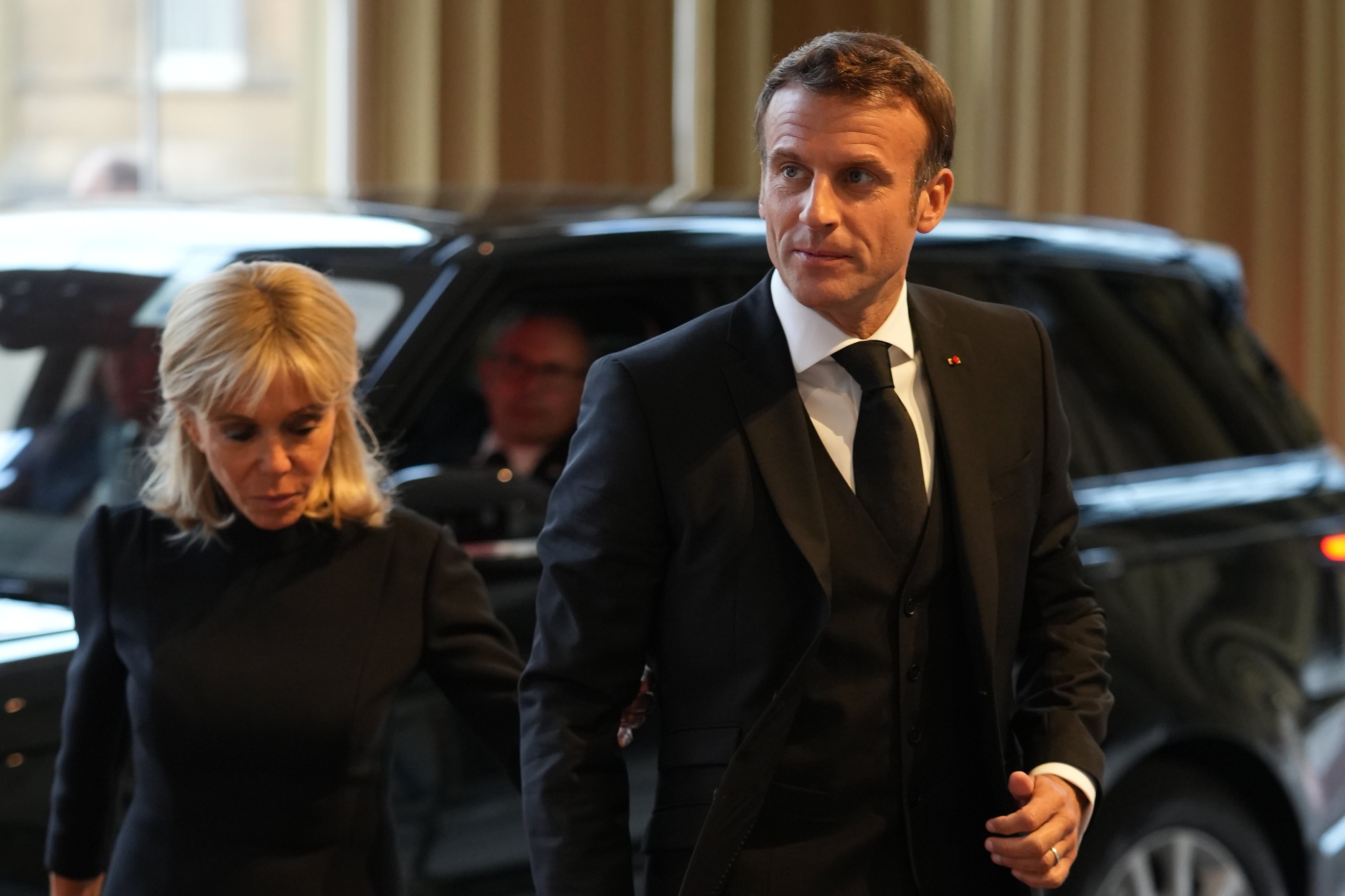 Emmanuel Macron and his wife Brigitte arrive for the reception